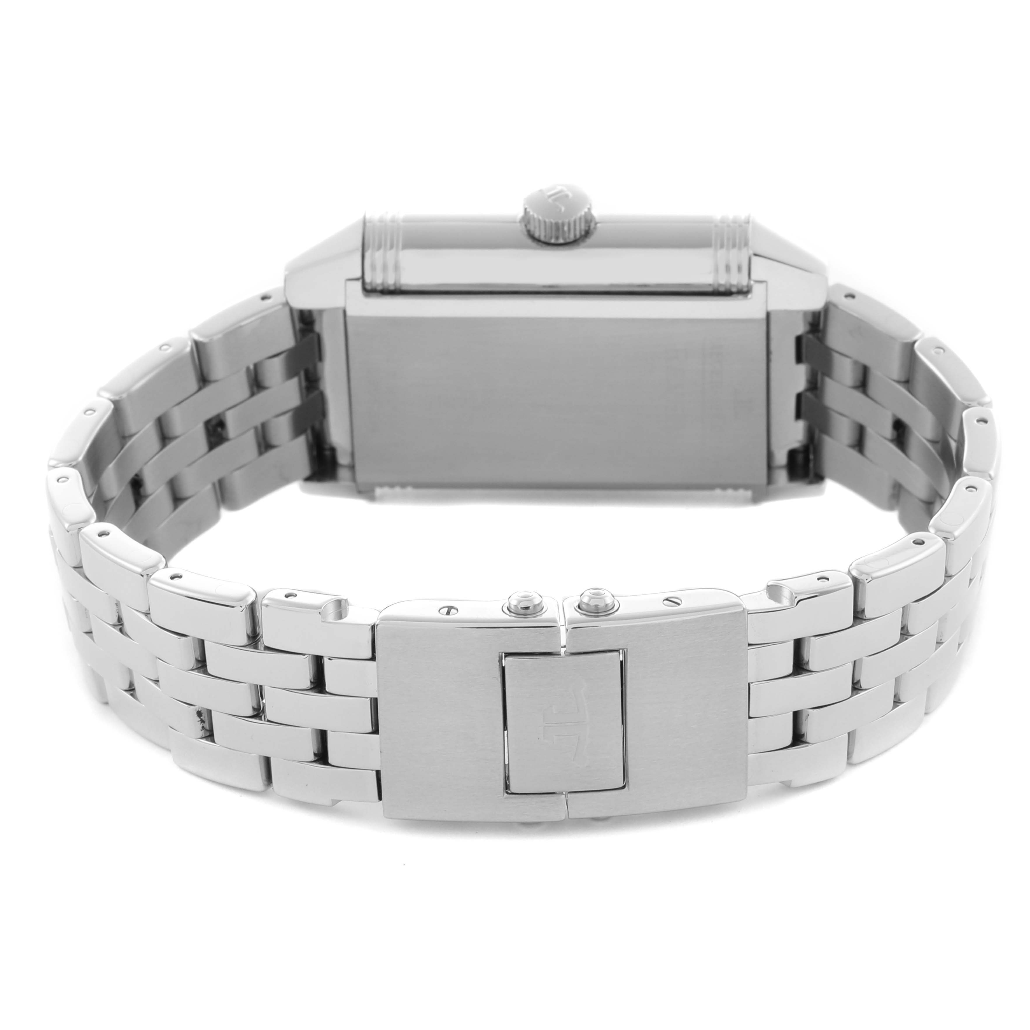 This image shows the back of the Jaeger-LeCoultre Reverso watch with its metal bracelet and clasp visible.