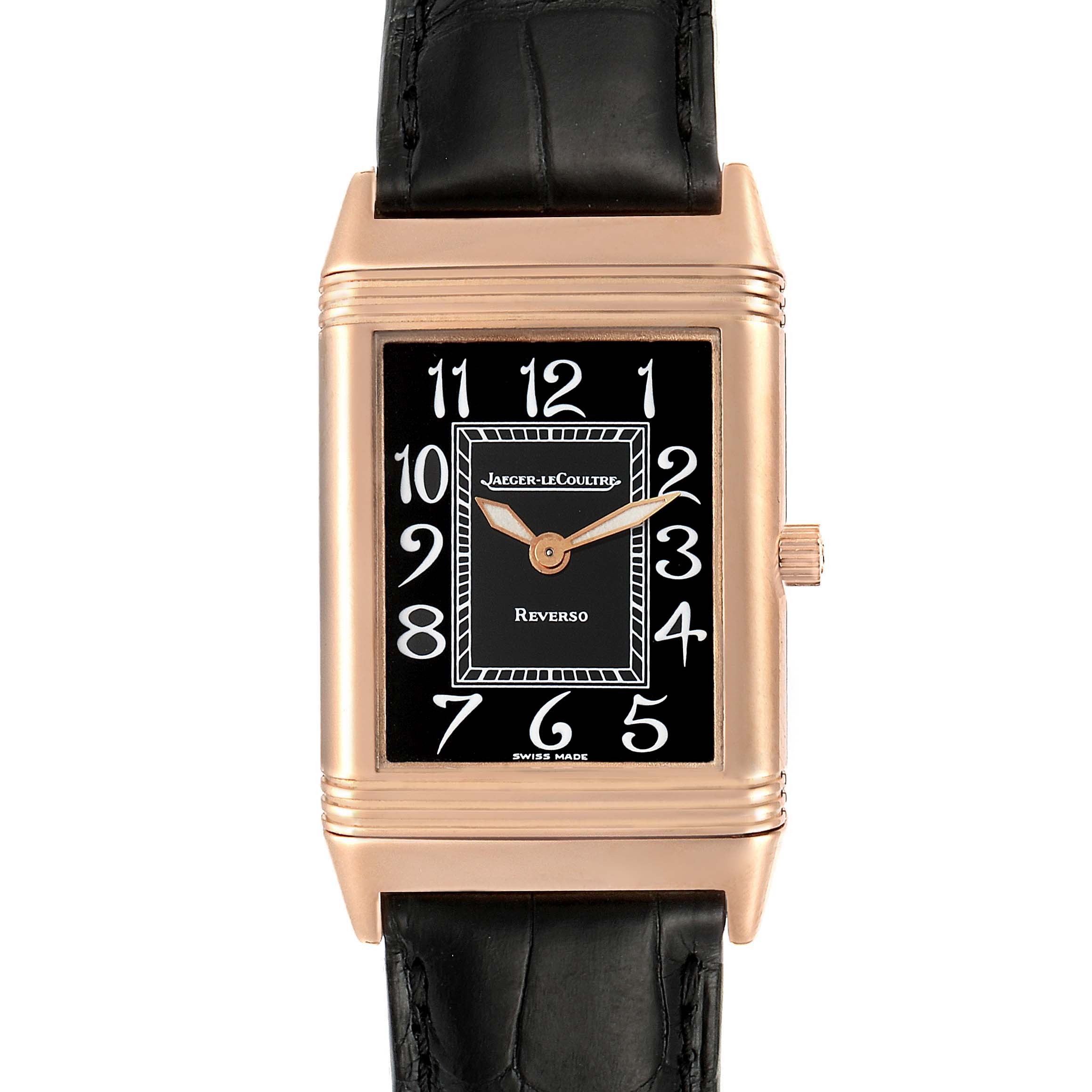 The image shows a front view of a Jaeger LeCoultre Reverso 250.2.86 Men's Rose Gold Black Dial 250.2.86 Men's Rose Gold Black Dial watch, highlighting its rectangular dial and black leather strap.