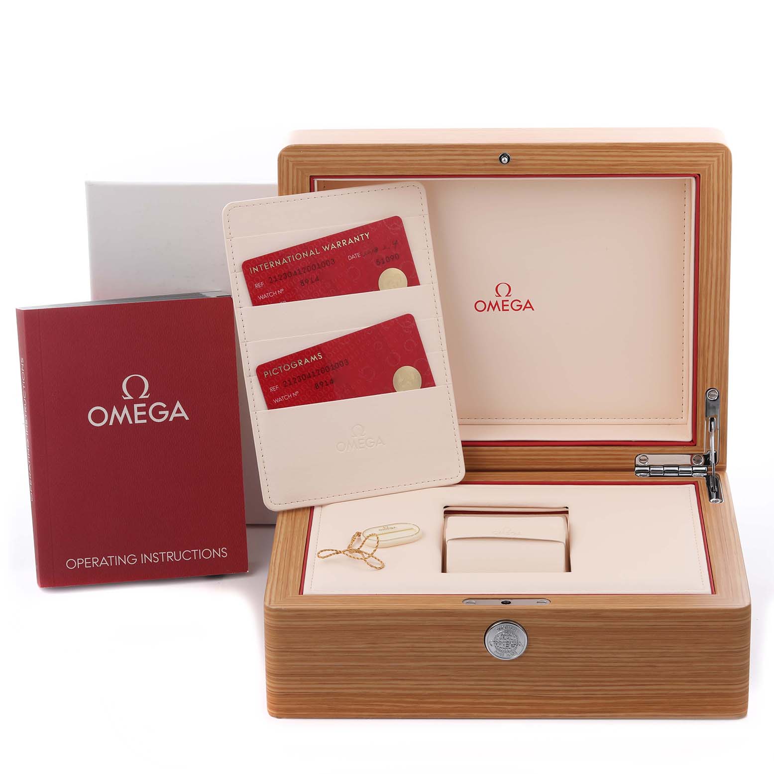 The image shows the Omega Seamaster 212.30.41.20.01.003 Men
s Stainless Steel Black Dial 212.30.41.20.01.003 Men
s Stainless Steel Black Dial watch box with warranty cards, operating instructions, and a tag, viewed from the top front angle.