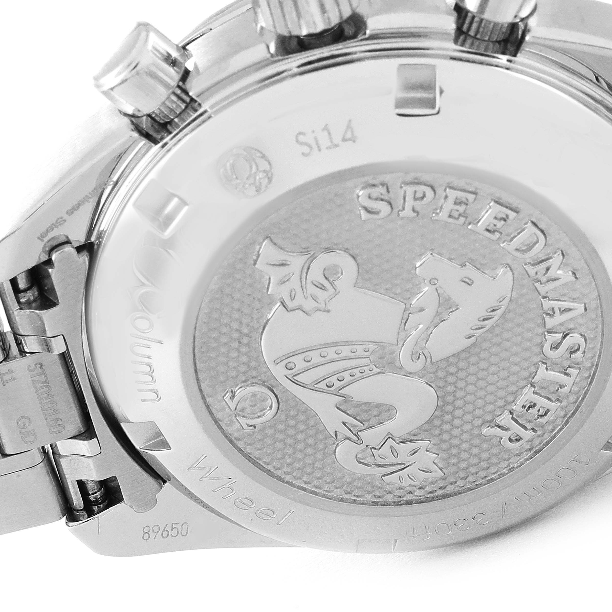 The image shows the engraved case back and pushers of the Omega Speedmaster 324.30.38.50.01.001 Men
s Stainless Steel Black Dial 324.30.38.50.01.001 Men
s Stainless Steel Black Dial watch.