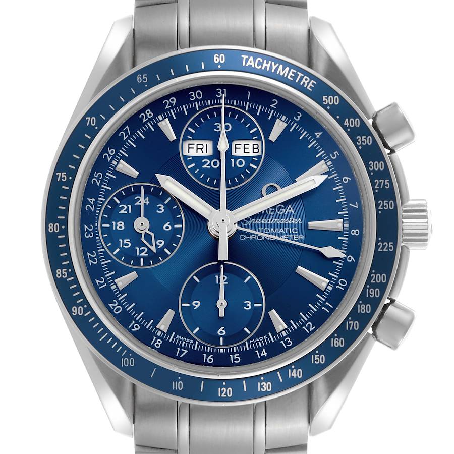 The Omega Speedmaster watch is shown from a front angle, highlighting its blue dial, tachymetre bezel, and chronograph functions.