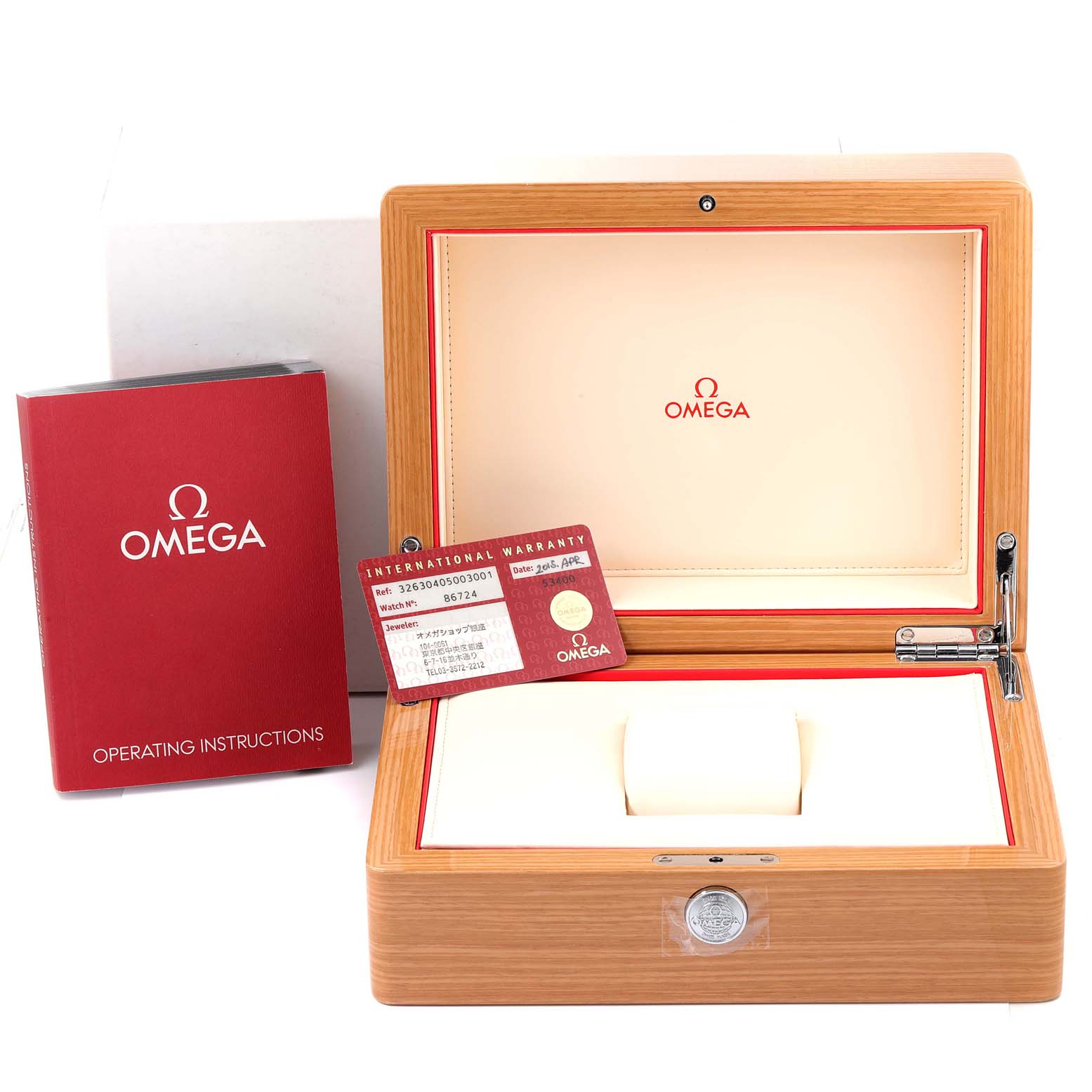 The image shows the Omega Speedmaster 326.30.40.50.03.001 Men
s Stainless Steel Blue Dial 326.30.40.50.03.001 Men
s Stainless Steel Blue Dial watch box, operating instructions booklet, and warranty card from a front angle.