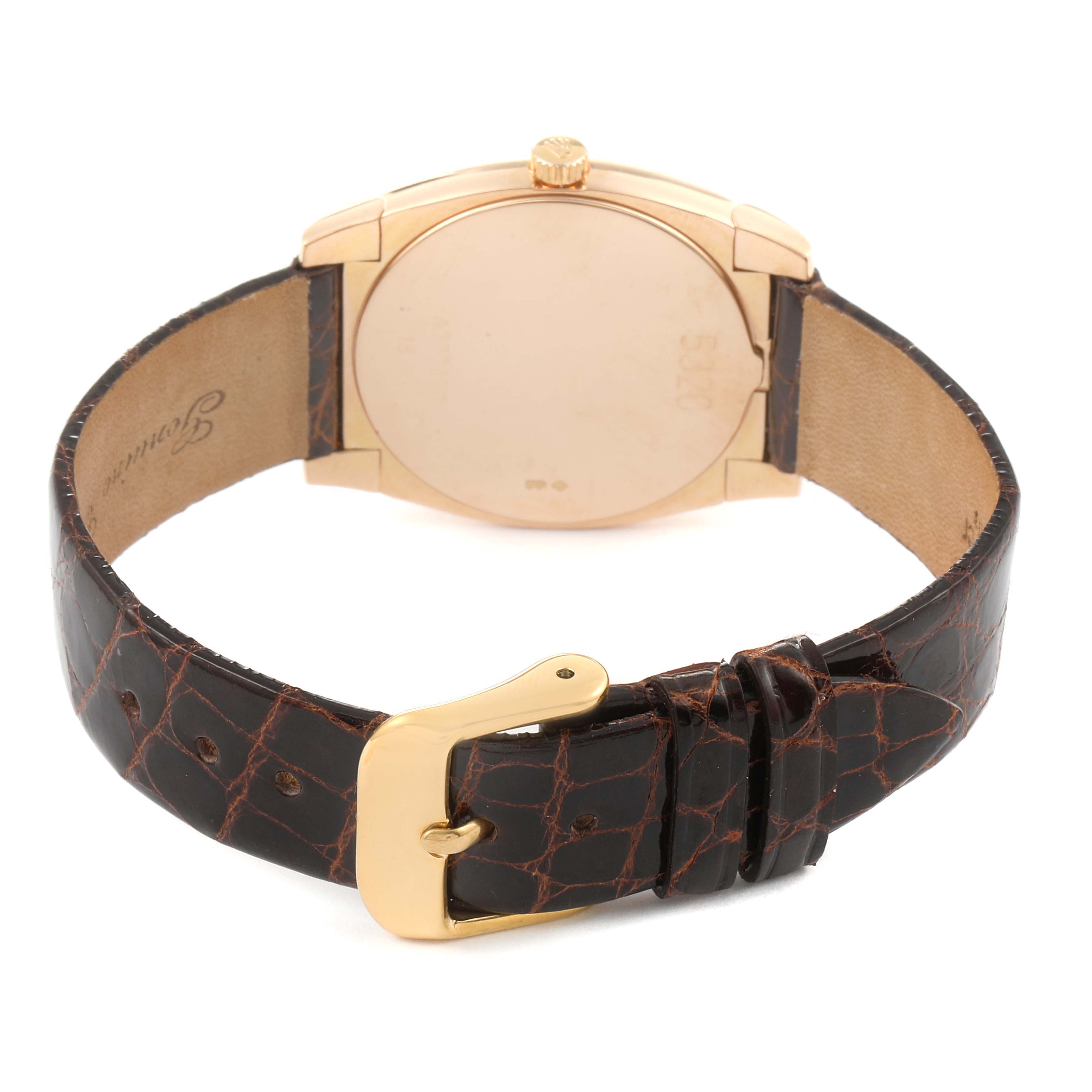 The image shows the back view of a Rolex Cellini 5320 Women's Rose Gold White Dial 5320 Women's Rose Gold White Dial watch, highlighting the clasp and leather strap.