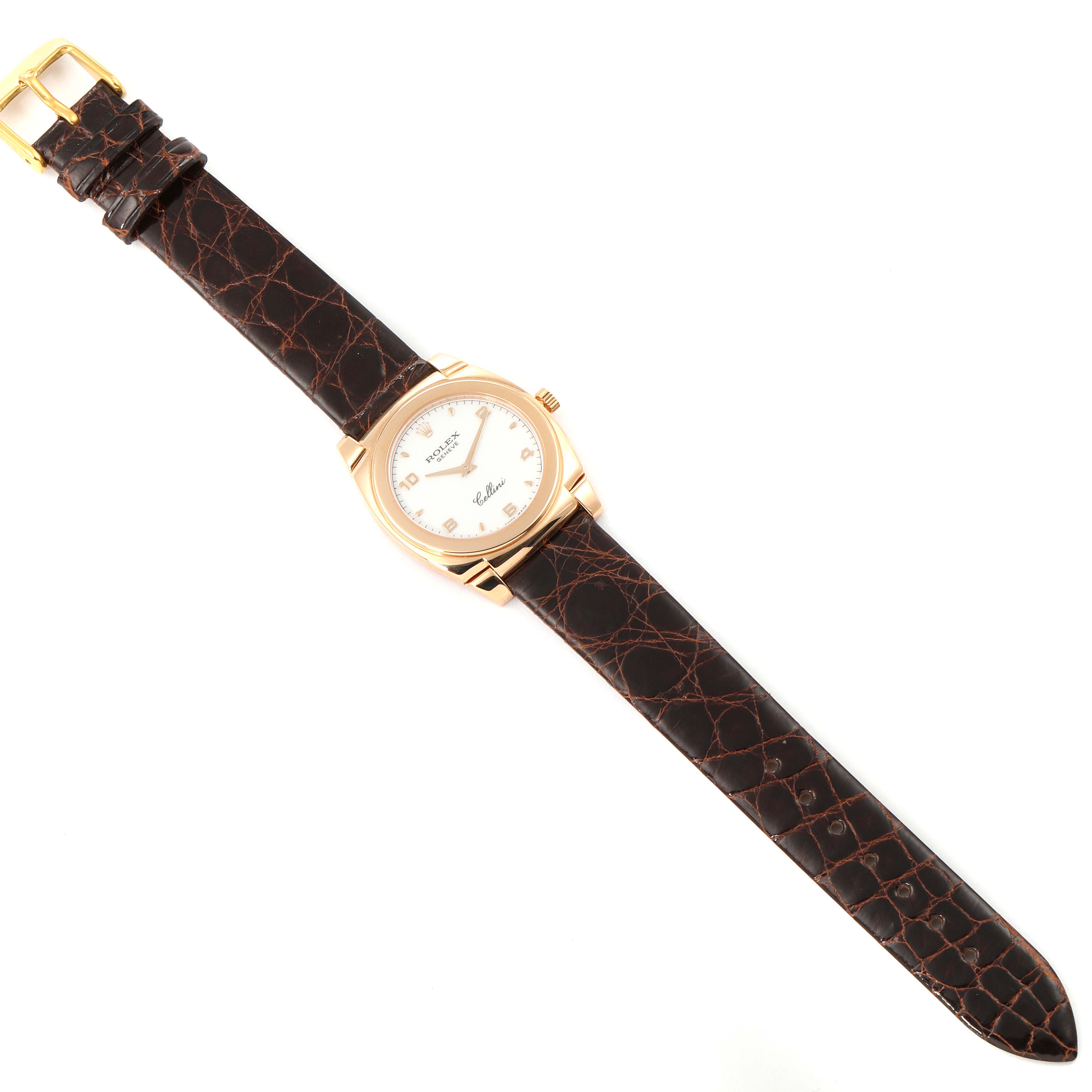 The Rolex Cellini 5320 Women's Rose Gold White Dial 5320 Women's Rose Gold White Dial watch is shown from a top-down angle, featuring its dial, case, crown, and leather strap.