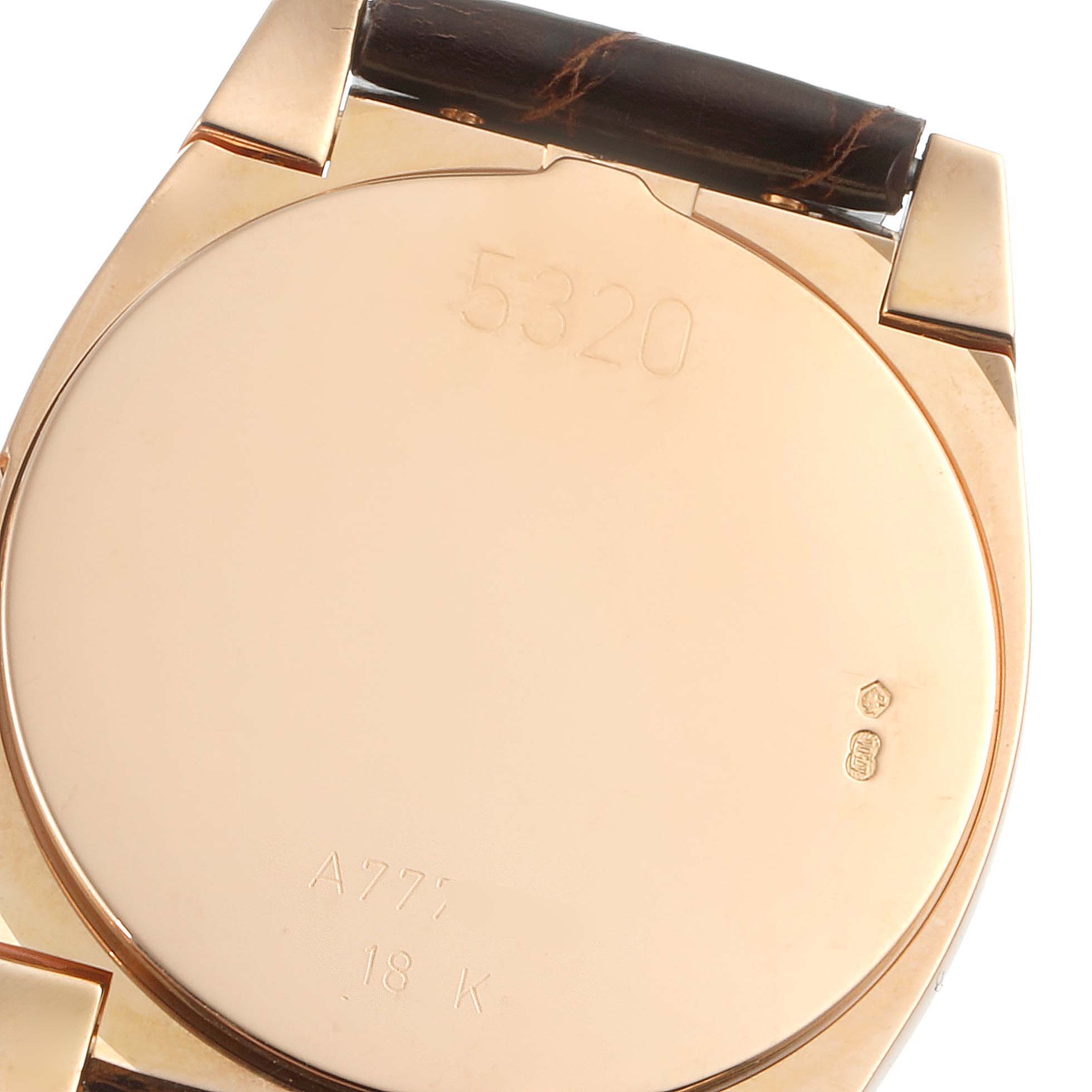 The image shows the back case of a Rolex Cellini 5320 Women's Rose Gold White Dial 5320 Women's Rose Gold White Dial watch, highlighting serial numbers and hallmarks.