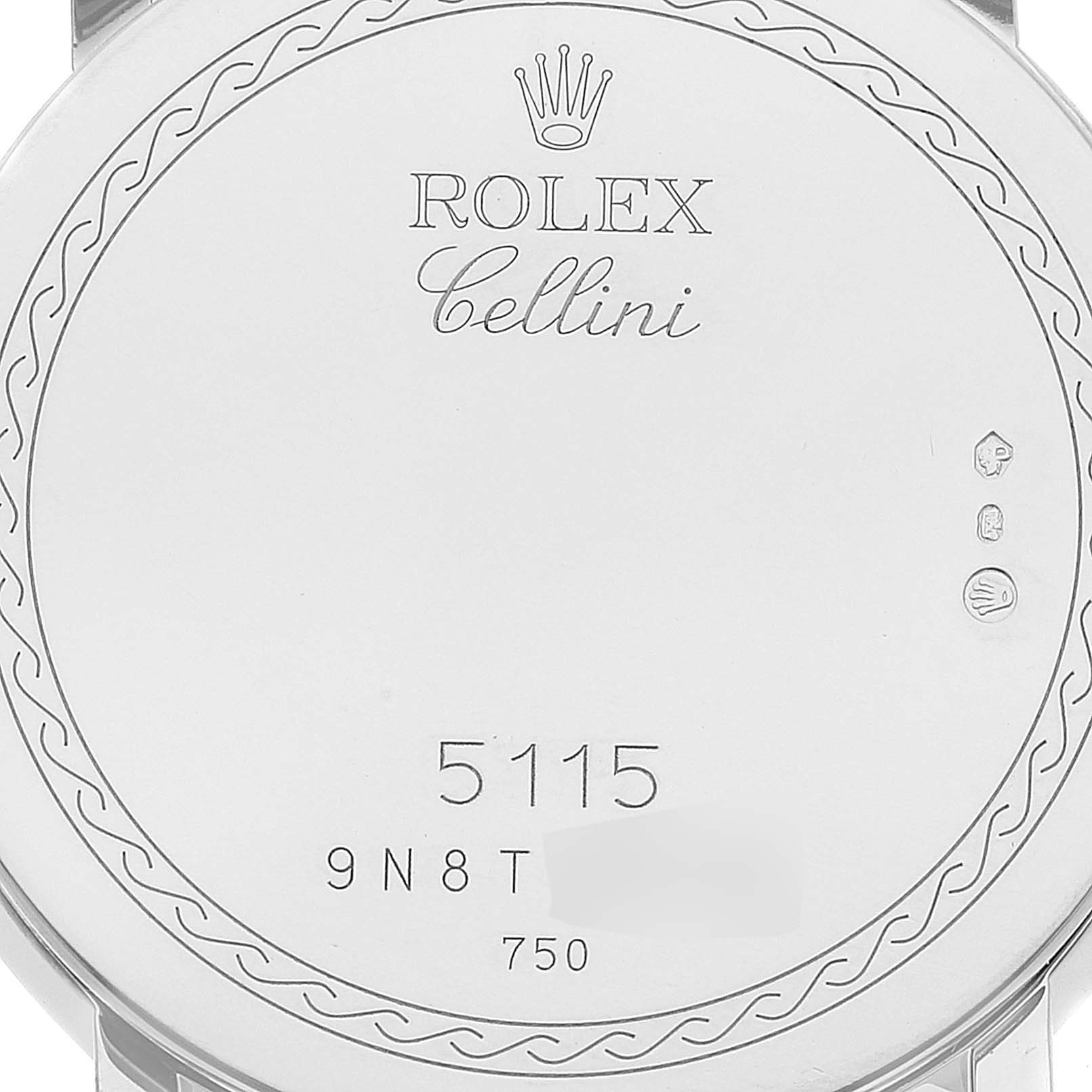 This image shows the engraved back of a Rolex Cellini 5115/9 Men's White Gold Beige Dial 5115/9 Men's White Gold Beige Dial watch, displaying its model number, brand, and decorative details.