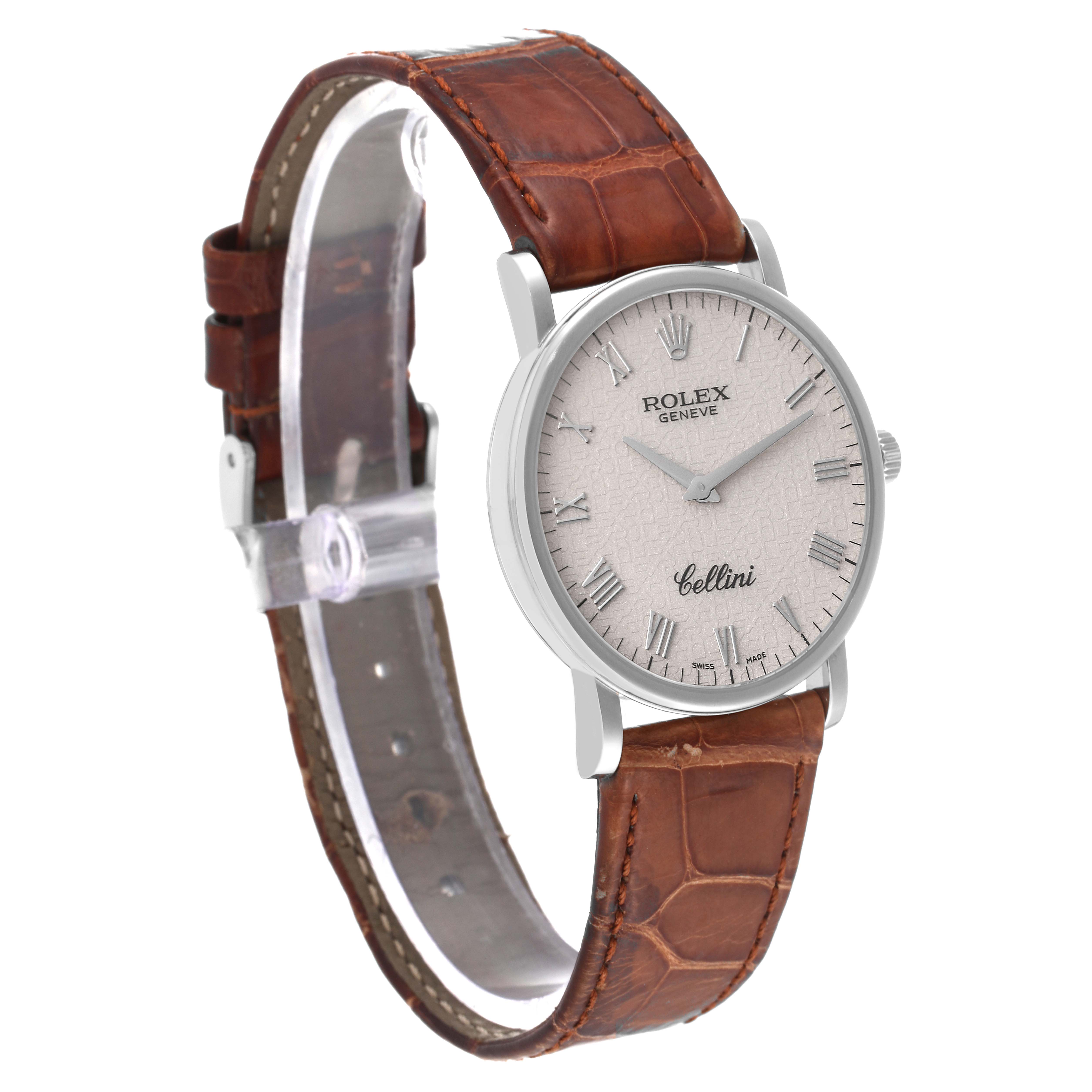 The Rolex Cellini 5115/9 Men's White Gold Beige Dial 5115/9 Men's White Gold Beige Dial watch is shown at an angle showcasing its face, dial, and brown leather strap.