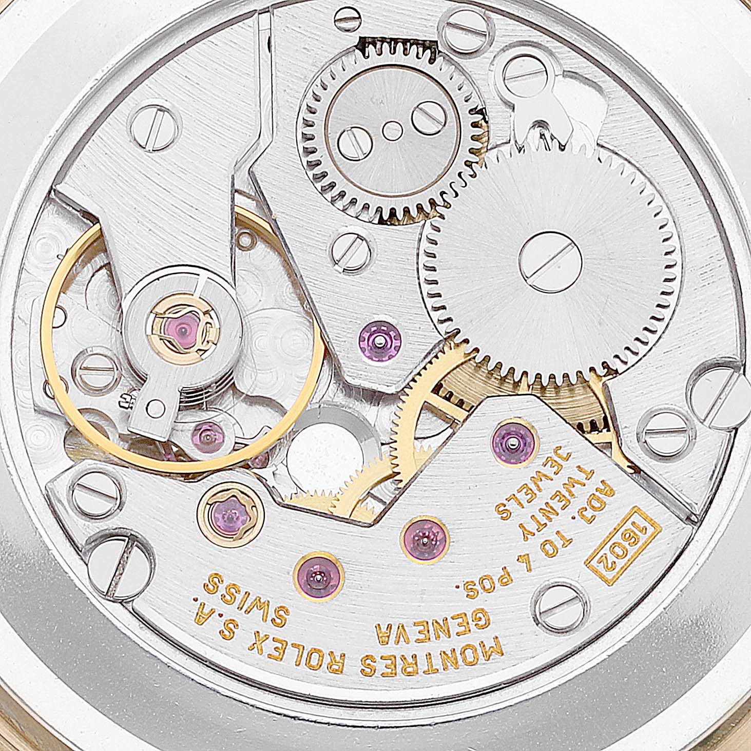 The image shows the internal mechanical movement of a Rolex Cellini 4112 Men
s Yellow Gold Champagne Dial 4112 Men
s Yellow Gold Champagne Dial watch viewed from the back.