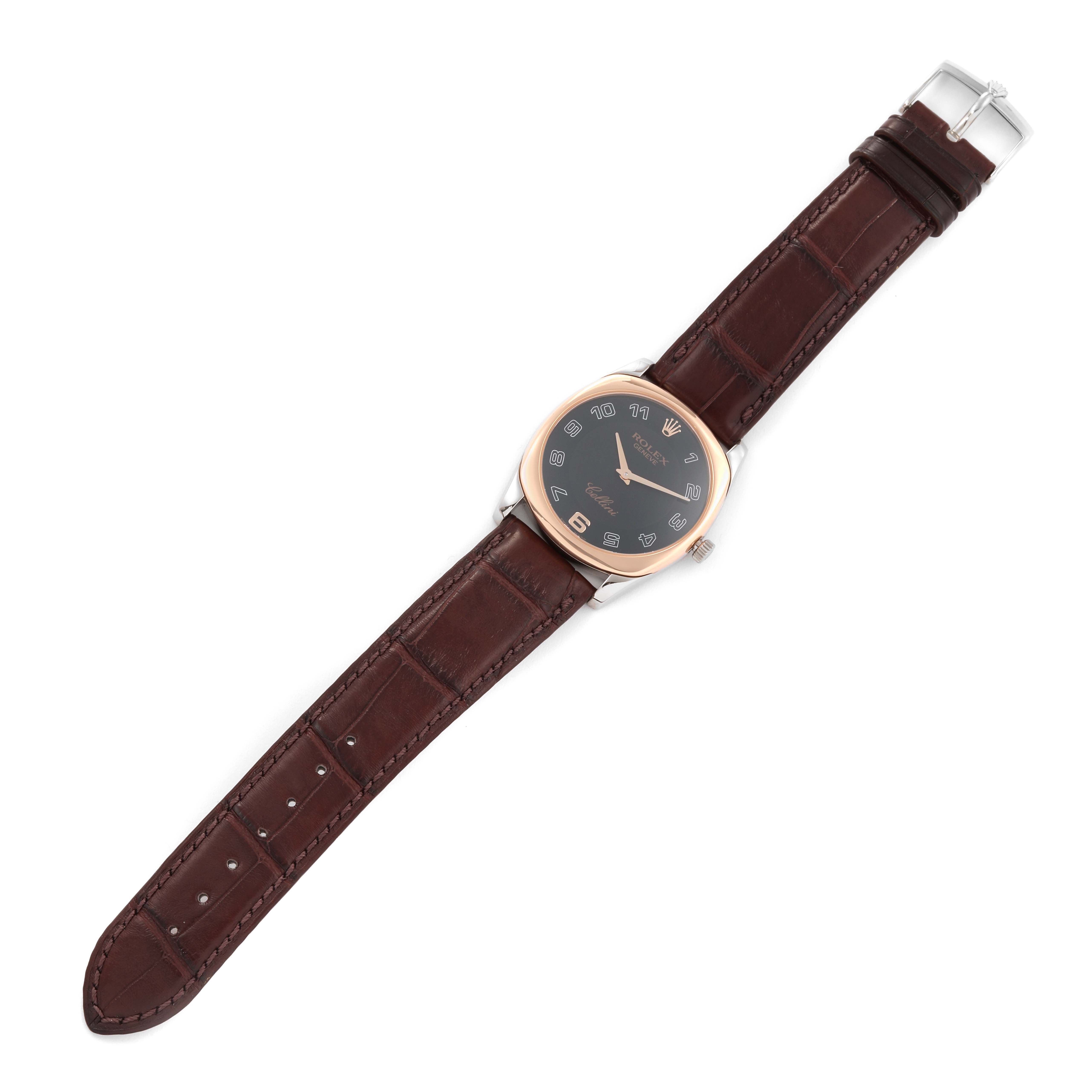 The image displays a Rolex Cellini 4233 Men's White Gold Black Dial 4233 Men's White Gold Black Dial watch from a top-down angle, showcasing its brown leather strap and black dial with gold accents.