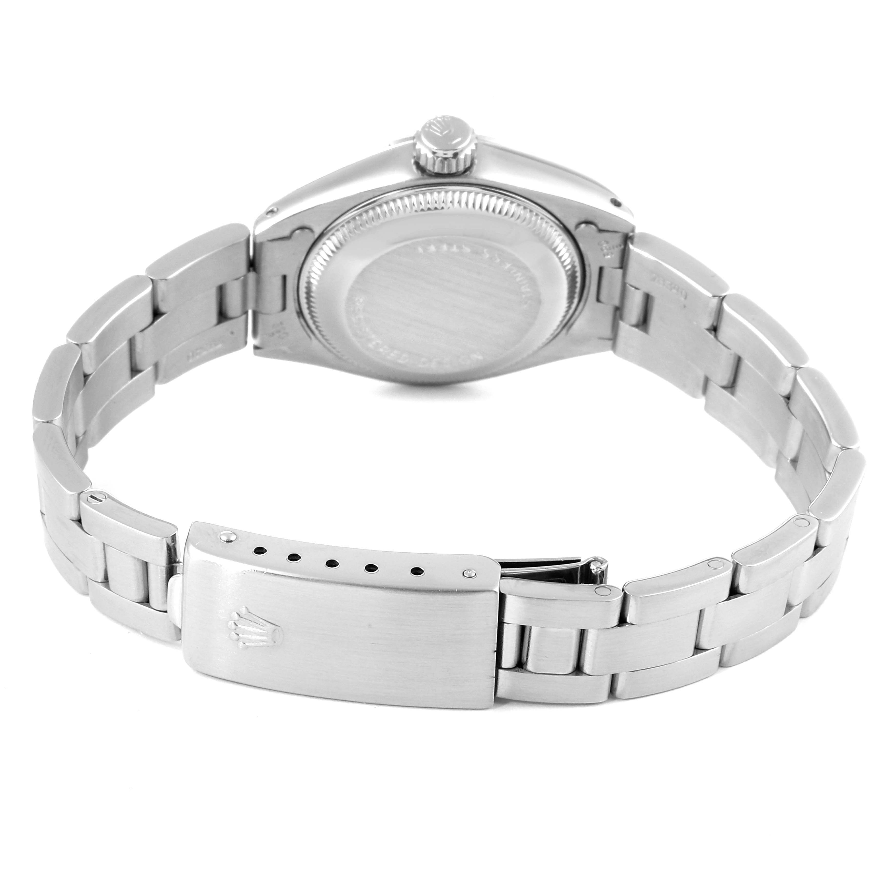 The image shows the backside of a Rolex Date 6916 Women's Stainless Steel Blue Dial 6916 Women's Stainless Steel Blue Dial model watch, highlighting the case back, bracelet, and clasp.