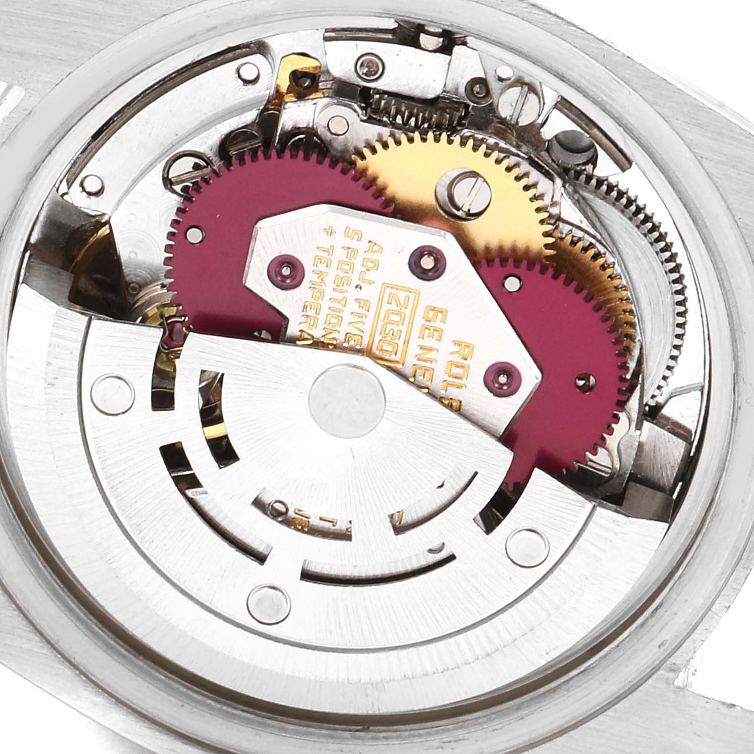 This image shows an overhead view of the movement mechanism parts of a Rolex Date 6916 Women's Stainless Steel Blue Dial 6916 Women's Stainless Steel Blue Dial model watch.