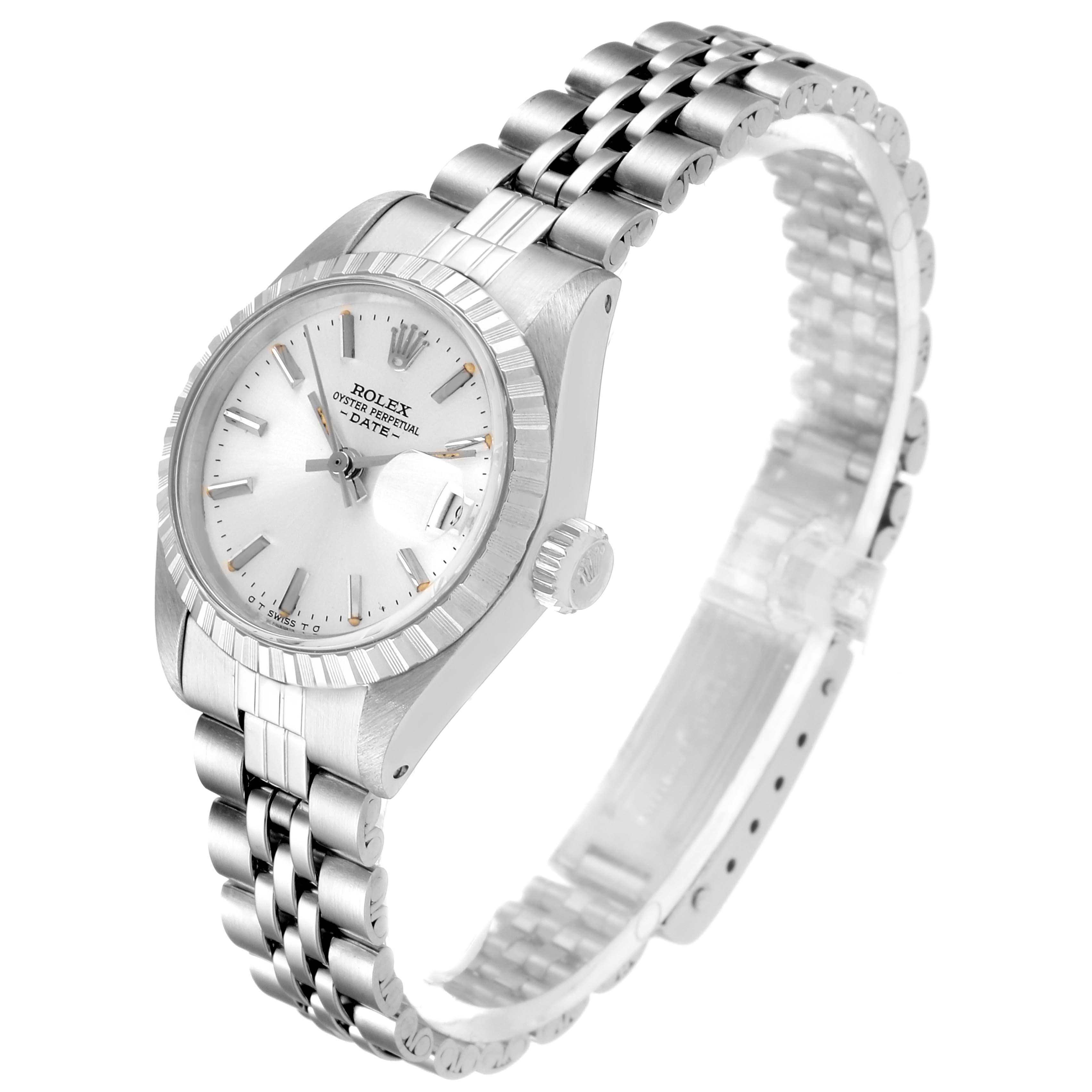 The image shows a Rolex Date 6924 Women's Stainless Steel Silver Dial 6924 Women's Stainless Steel Silver Dial model watch from an angled side view, highlighting the dial, bezel, crown, and bracelet.
