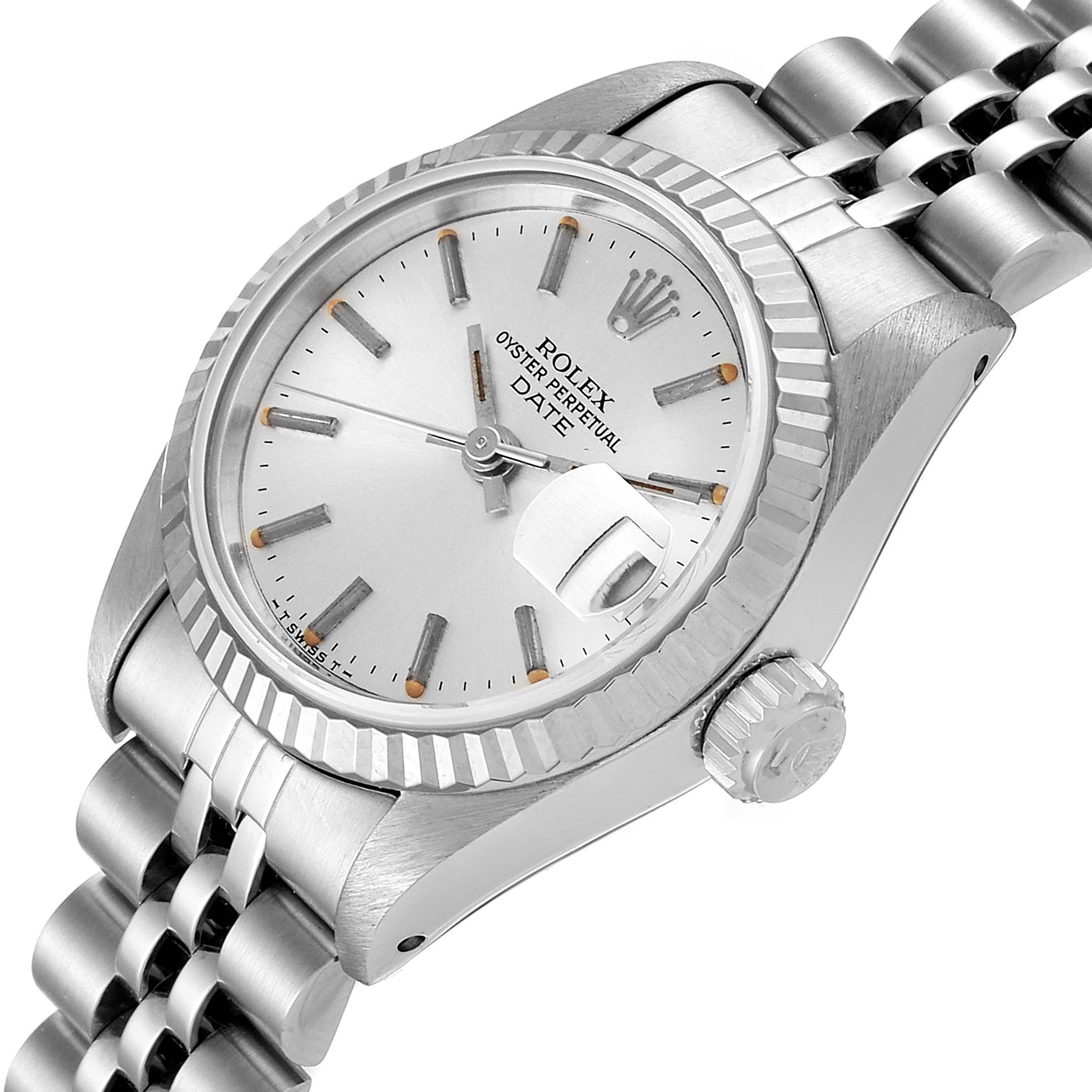 The image shows a close-up angled view of the dial, fluted bezel, crown, and jubilee bracelet of the Rolex Date 69174 Women's Stainless Steel Silver Dial 69174 Women's Stainless Steel Silver Dial model watch.