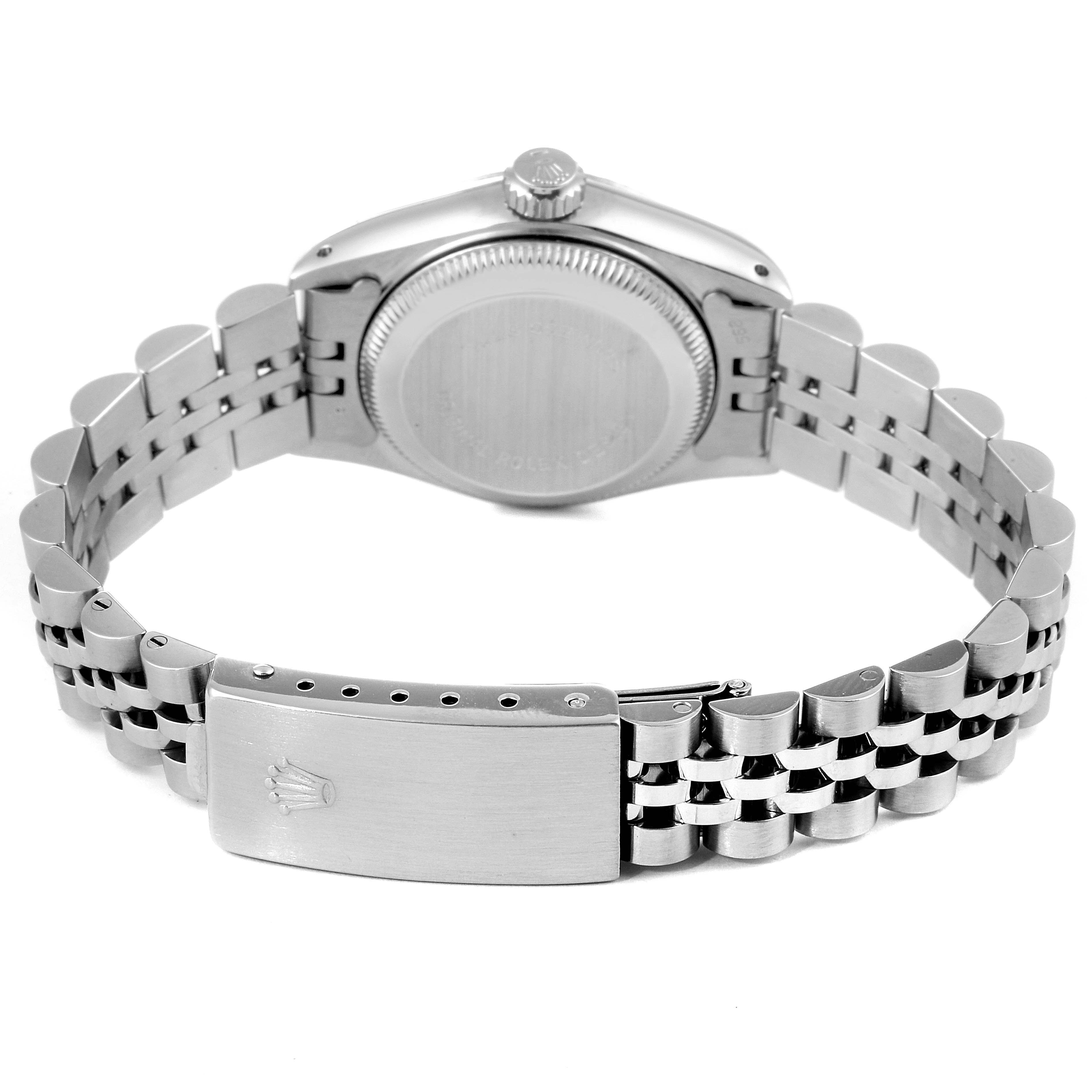 The image shows the backside of a Rolex Date 69174 Women's Stainless Steel Silver Dial 69174 Women's Stainless Steel Silver Dial model watch, highlighting the clasp and bracelet.