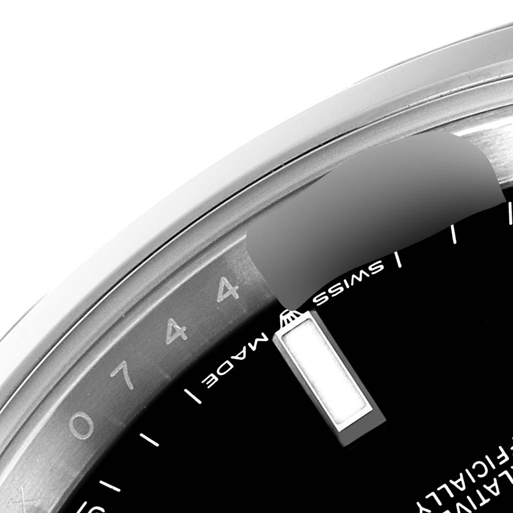 This image shows a close-up of the dial and part of the bezel of the Rolex Datejust 41 126300 Men's Stainless Steel Black Dial 126300 Men's Stainless Steel Black Dial watch.