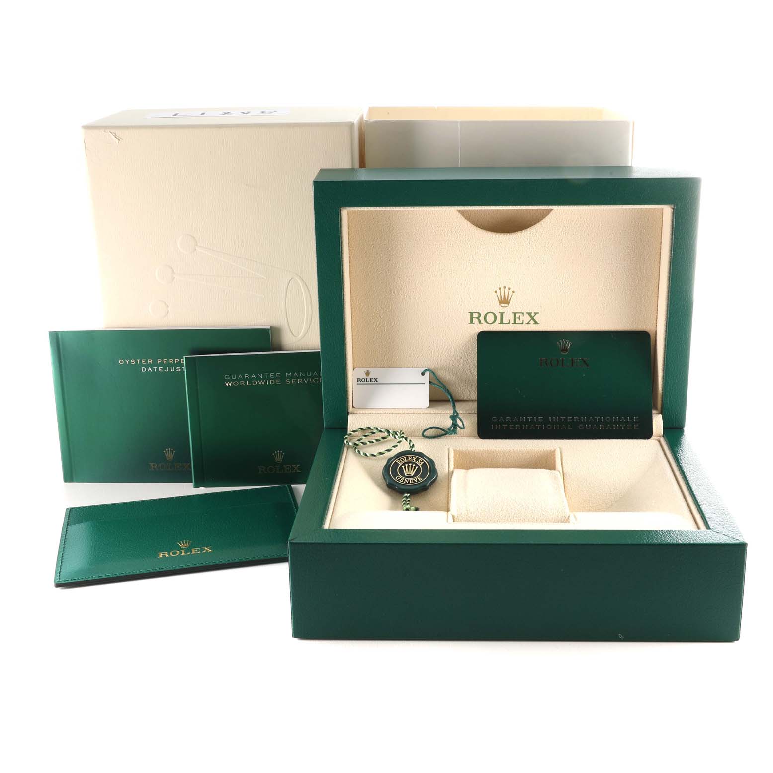 The image shows the packaging, manuals, tags, and guarantee card for the Rolex Datejust 41 126334 Men
s Stainless Steel Green Dial 126334 Men
s Stainless Steel Green Dial watch.