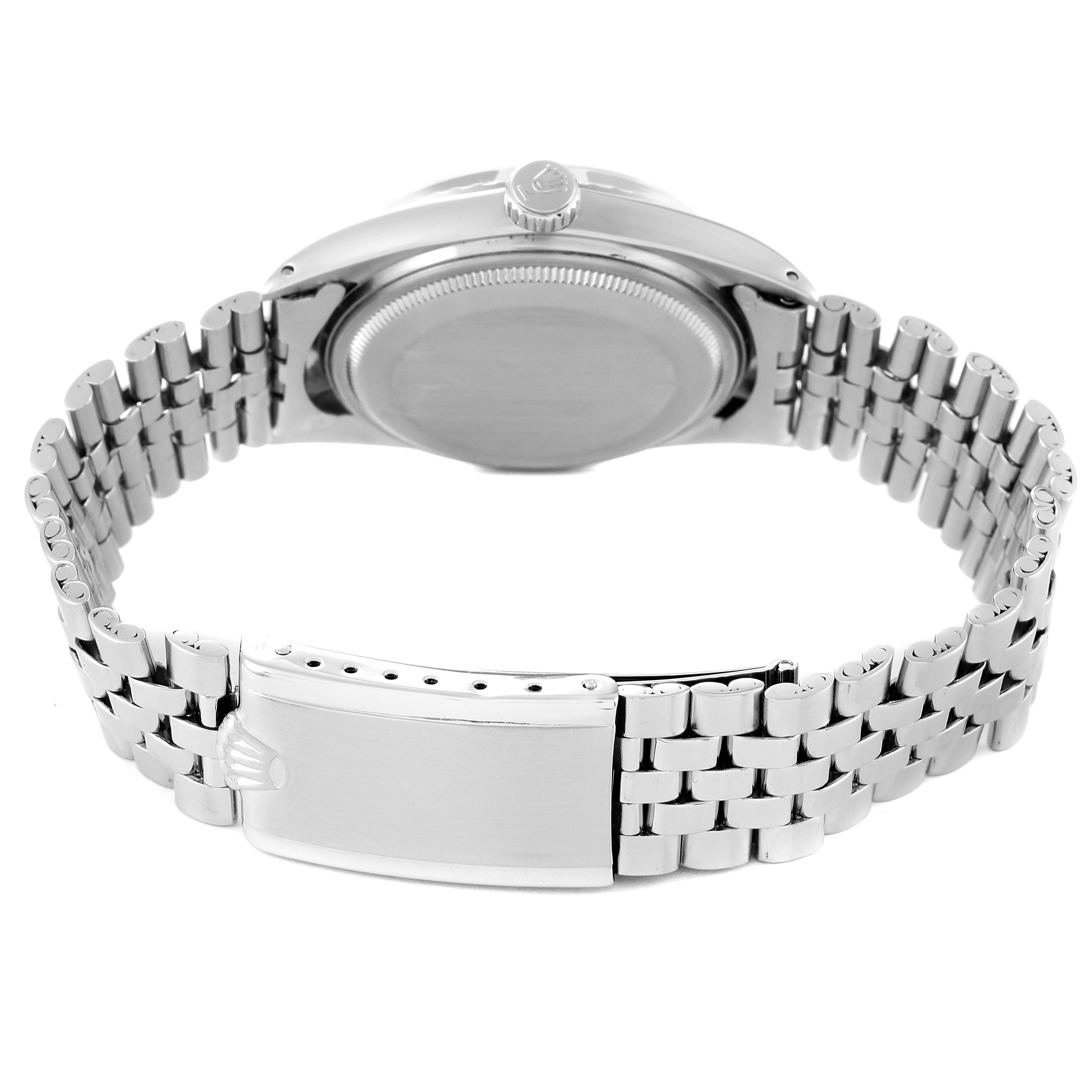 The image shows the back side of the Rolex Vintage Collection 1603 Men
s Stainless Steel Black Dial 1603 Men
s Stainless Steel Black Dial model watch, highlighting the bracelet and clasp.