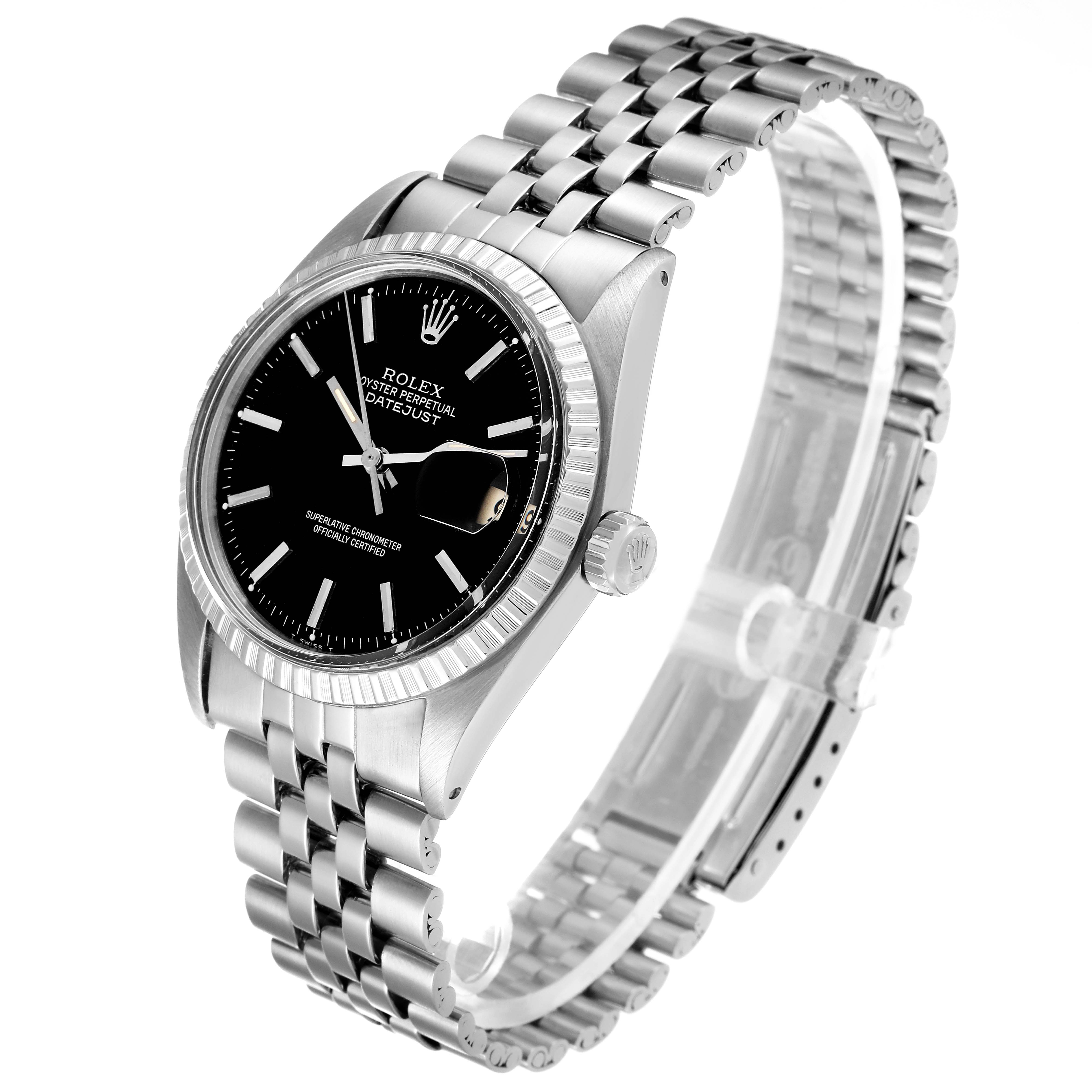 The image shows a Rolex Vintage Collection 1603 Men
s Stainless Steel Black Dial 1603 Men
s Stainless Steel Black Dial Datejust model watch, featuring its face, strap, and bezel from a tilted angle.