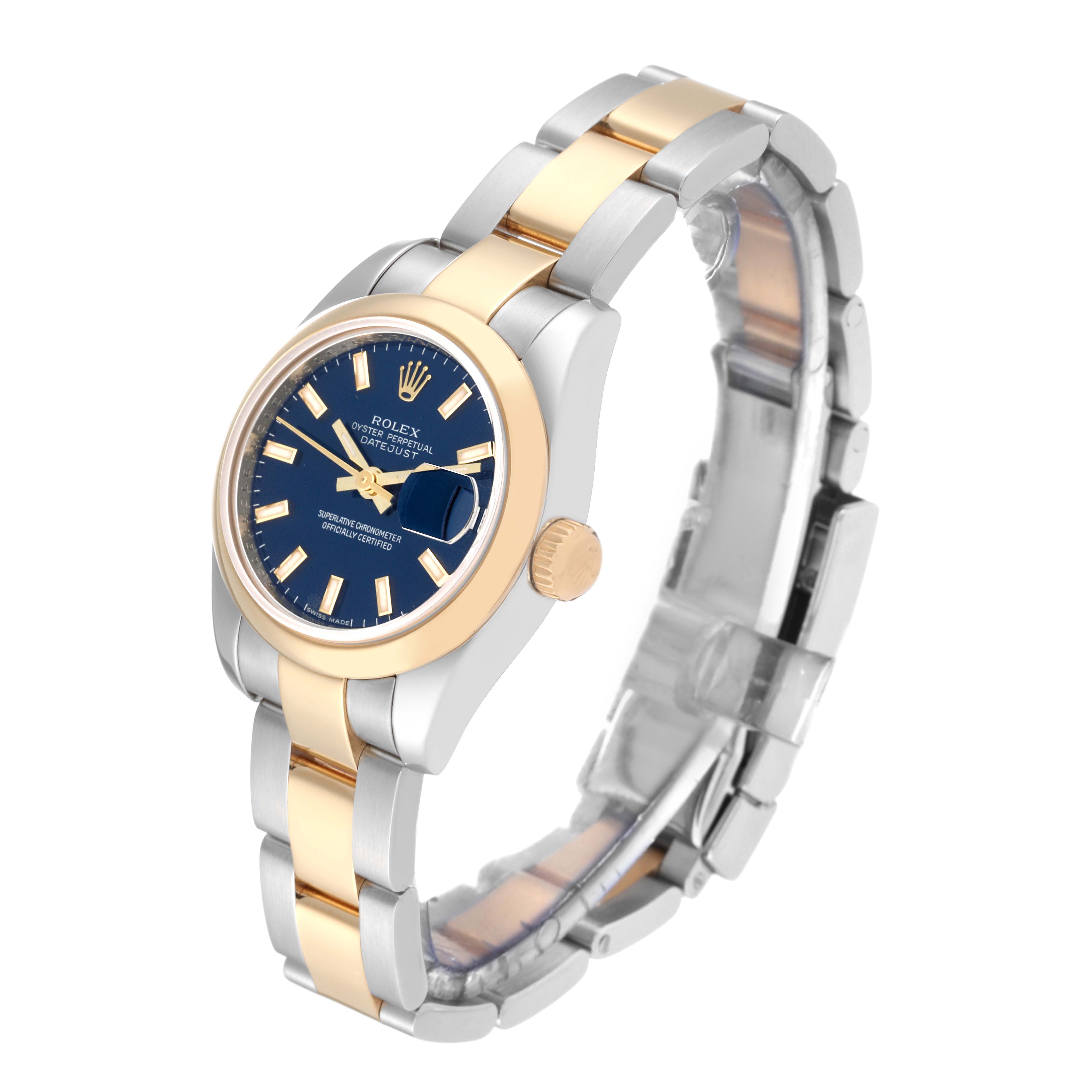 The Rolex Datejust 179163 Women's Steel and Gold (two tone) Blue Dial 179163 Women's Steel and Gold (two tone) Blue Dial watch is shown at a front-side angle, highlighting its blue dial, gold bezel, and two-tone metal bracelet.