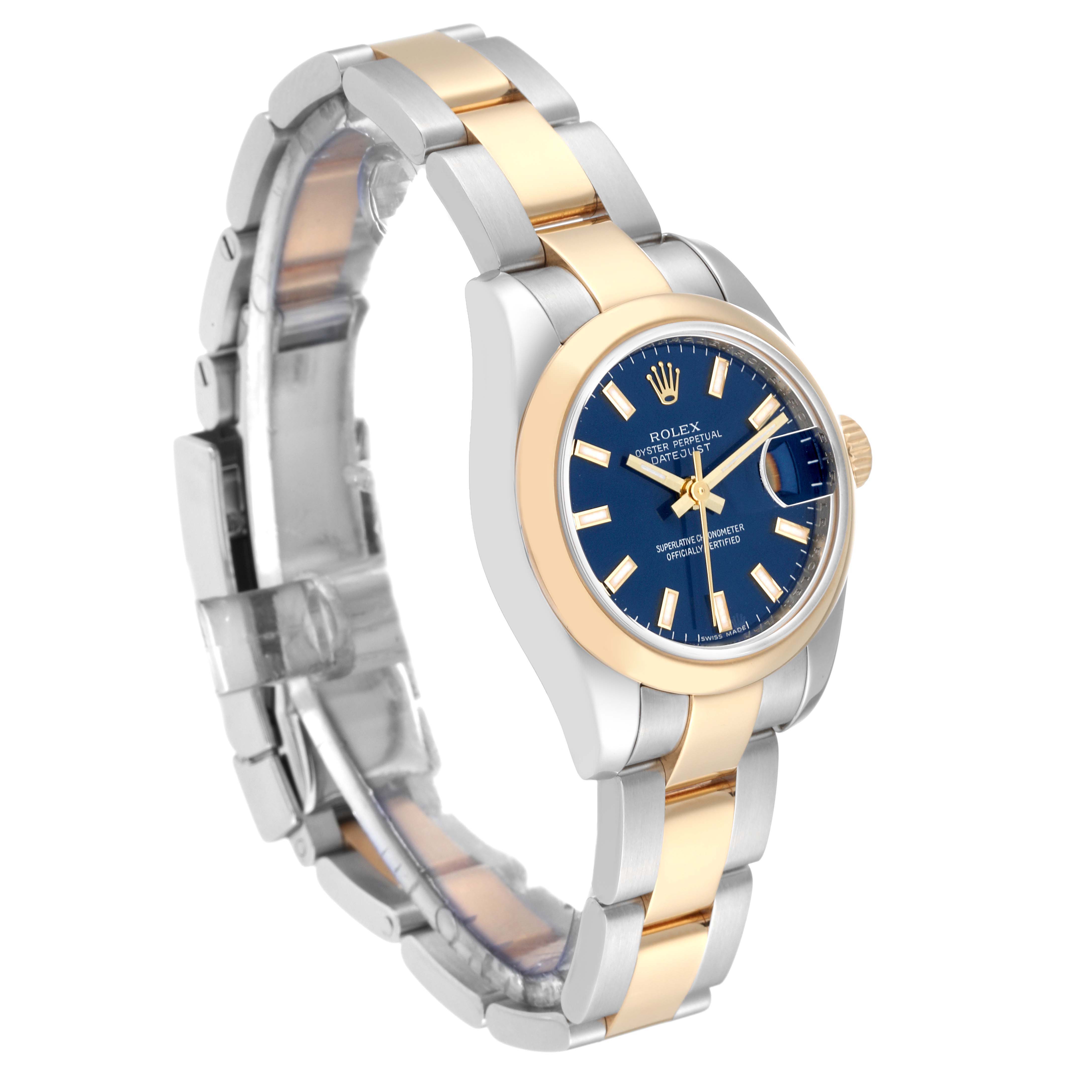 The image shows a Rolex Datejust 179163 Women's Steel and Gold (two tone) Blue Dial 179163 Women's Steel and Gold (two tone) Blue Dial watch from a three-quarter angle, highlighting its two-tone bracelet and blue dial.