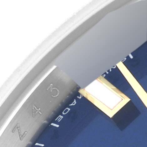 The image shows a close-up of the bezel, dial, and markers of a Rolex Datejust 179163 Women's Steel and Gold (two tone) Blue Dial 179163 Women's Steel and Gold (two tone) Blue Dial watch.