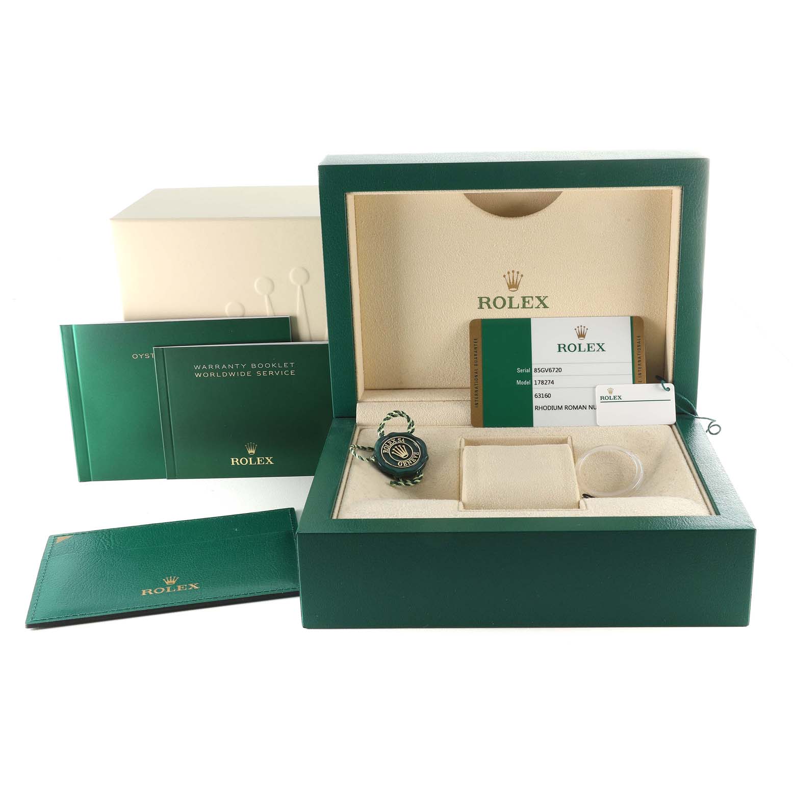 This image shows a Rolex Mid-Size 178274 Women
s Stainless Steel Silver Dial 178274 Women
s Stainless Steel Silver Dial model watch with its box, warranty card, booklets, and additional accessories.