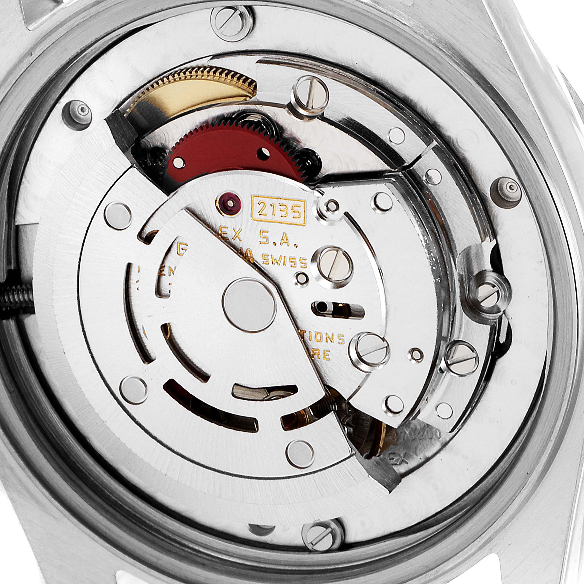 This image shows a close-up of the internal mechanism from the back of a Rolex Mid-Size 68273 Women
s Steel and Gold (two tone) White Dial 68273 Women
s Steel and Gold (two tone) White Dial model watch, highlighting the movement components.