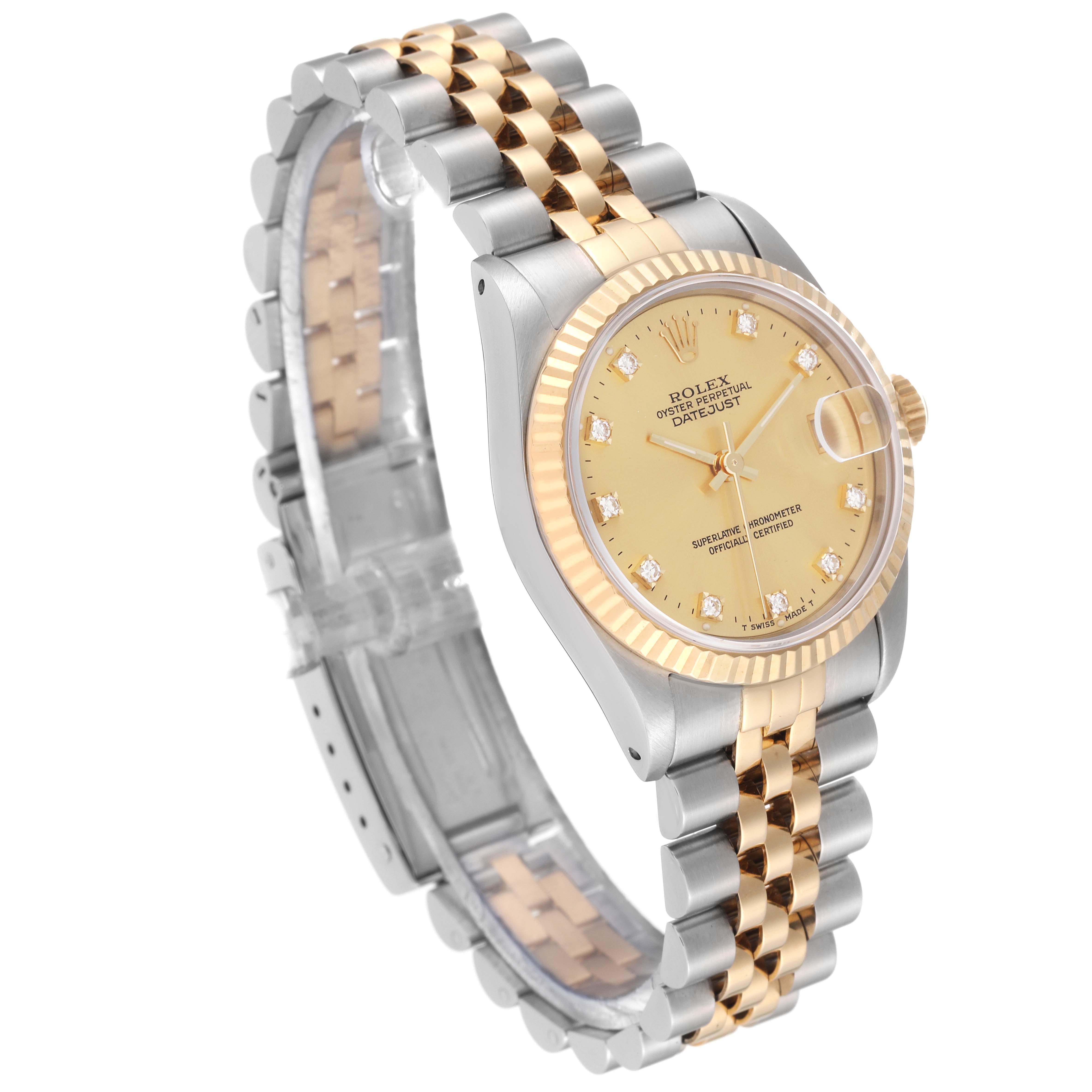 The image shows a side-angle view of a Rolex Mid-Size 68273 Women's Steel and Gold (two tone) Champagne Dial 68273 Women's Steel and Gold (two tone) Champagne Dial Datejust, displaying its face, bezel, and bi-color bracelet.