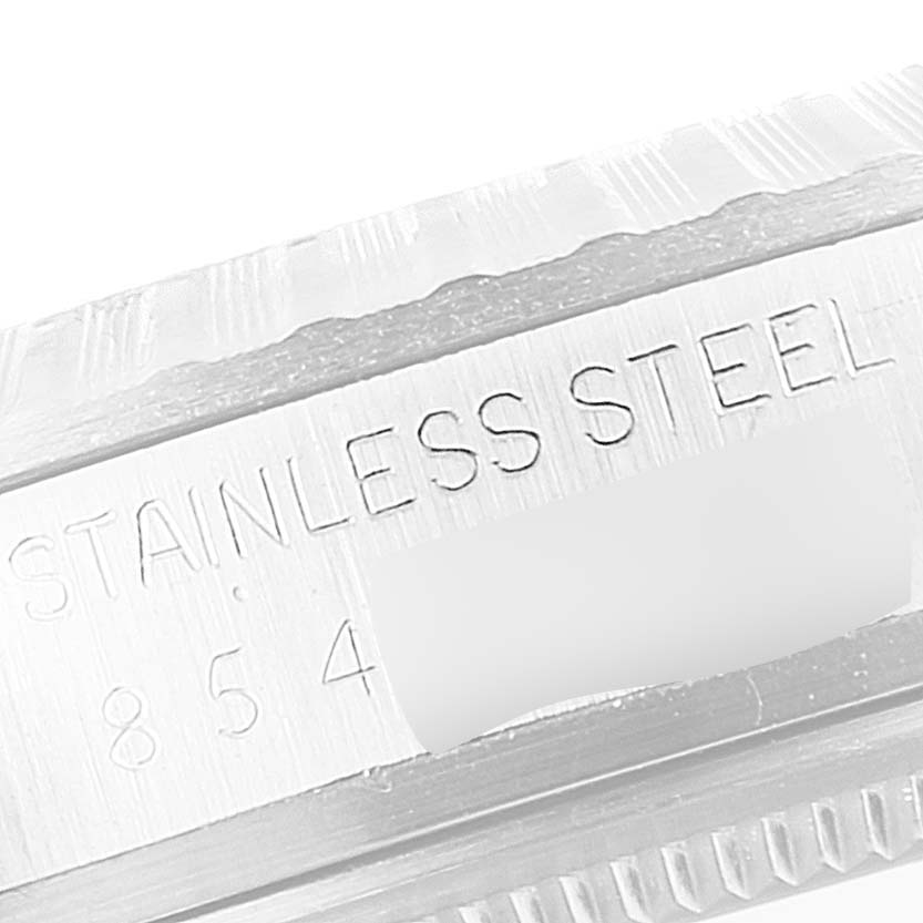 This close-up image shows the stainless steel casing with engravings on a Rolex Vintage Collection 16030 Men
s Stainless Steel Silver Dial 16030 Men
s Stainless Steel Silver Dial model watch.