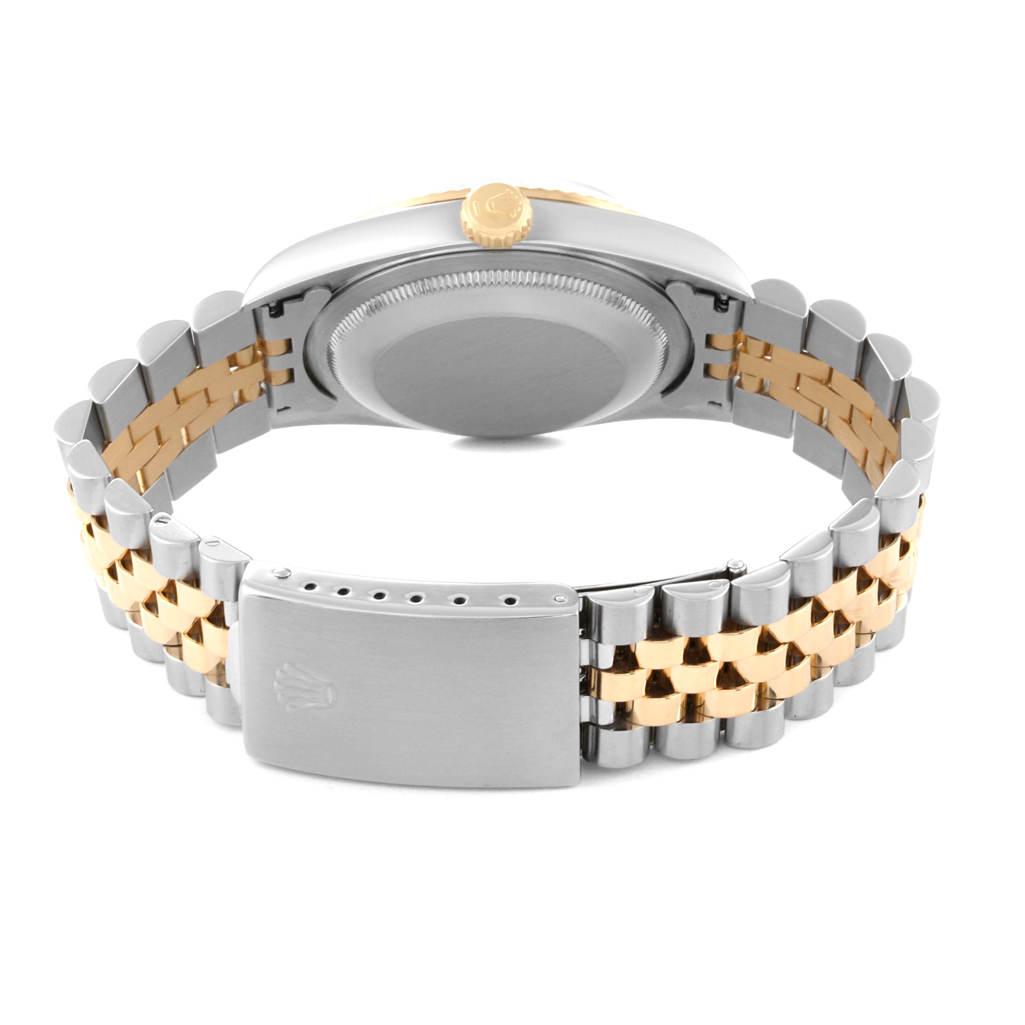 The image shows the back view of a Rolex Datejust 16233 Men's Steel and Gold (two tone) Grey Dial 16233 Men's Steel and Gold (two tone) Grey Dial watch, highlighting its two-tone bracelet and clasp.