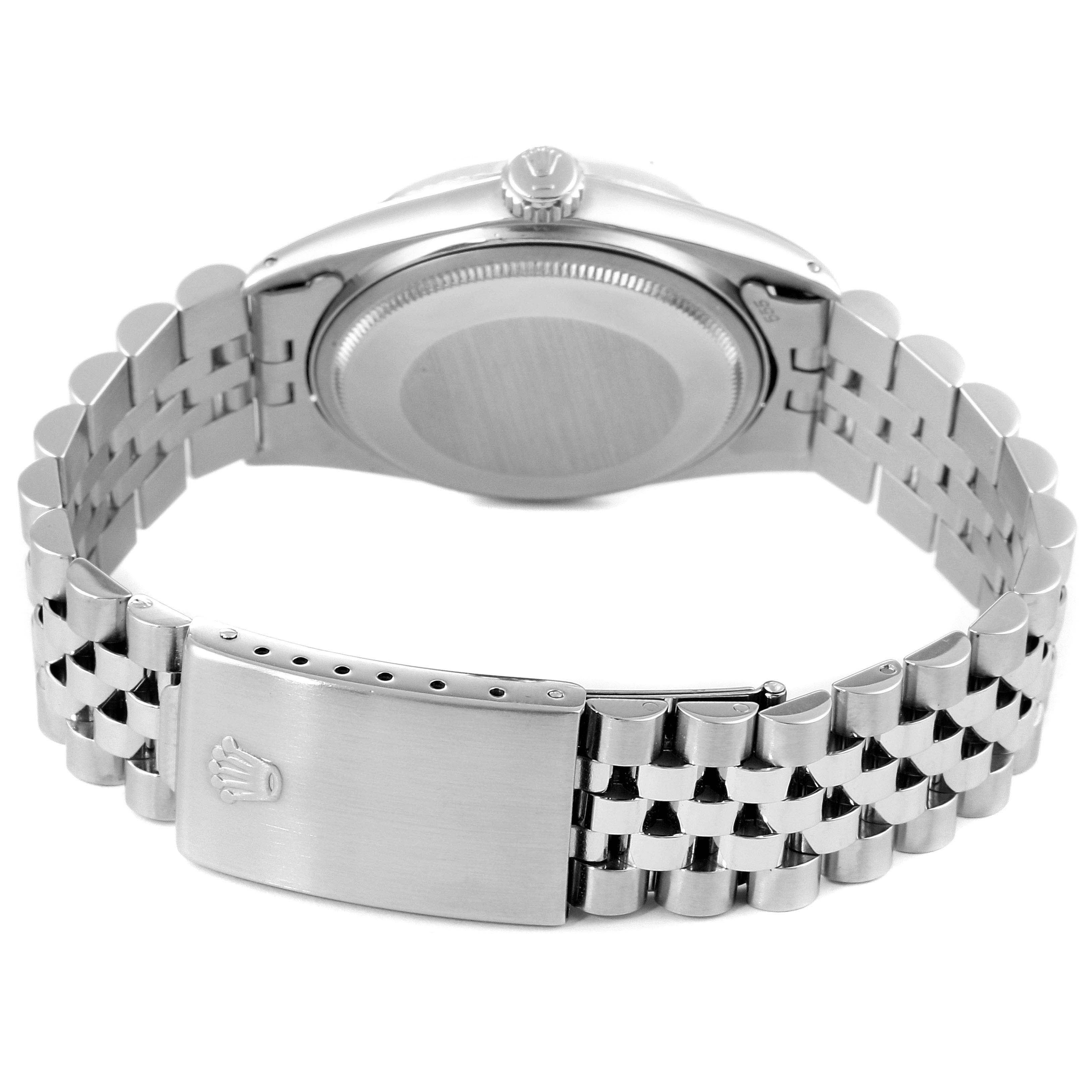 The image shows the back view of the Rolex Vintage Collection 1601 Men's Stainless Steel Silver Dial 1601 Men's Stainless Steel Silver Dial model, highlighting the watch case and its metal bracelet with the clasp.