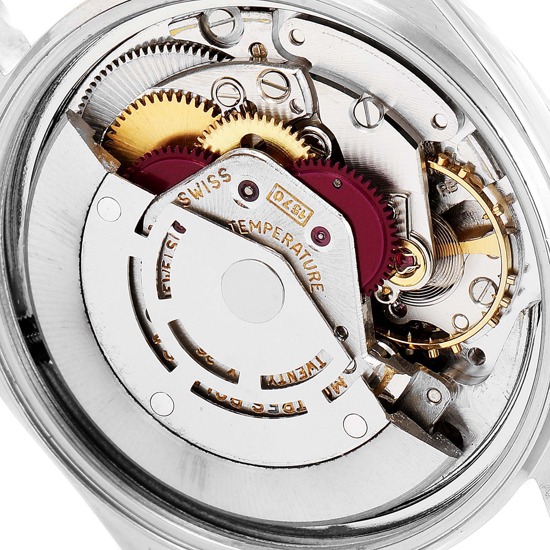 The image shows the internal mechanism of a Vintage Collection Rolex watch viewed from the back.