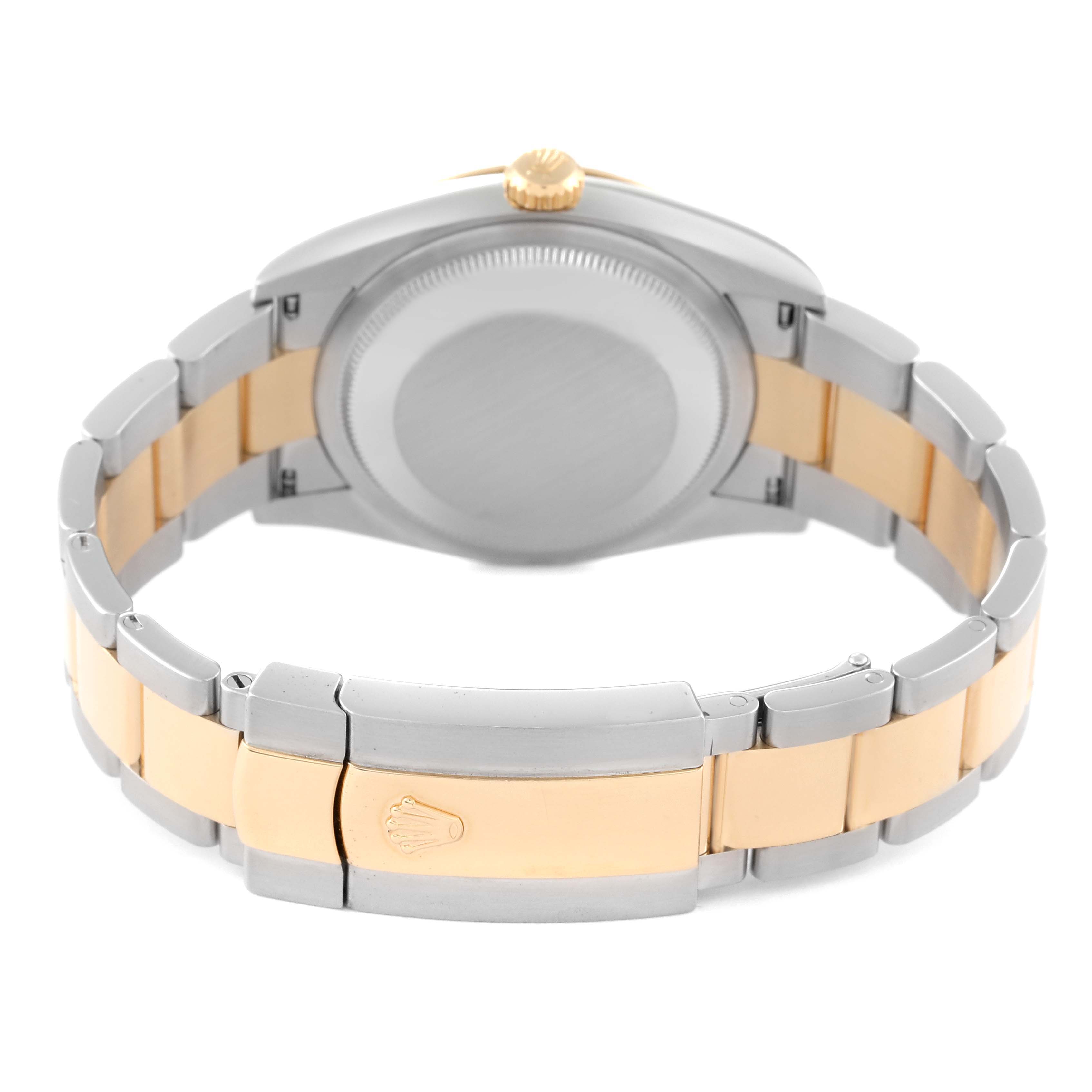 This image shows the back of the Rolex Datejust 126233 Men's Steel and Gold (two tone) Champagne Dial 126233 Men's Steel and Gold (two tone) Champagne Dial watch and its two-tone metal bracelet.