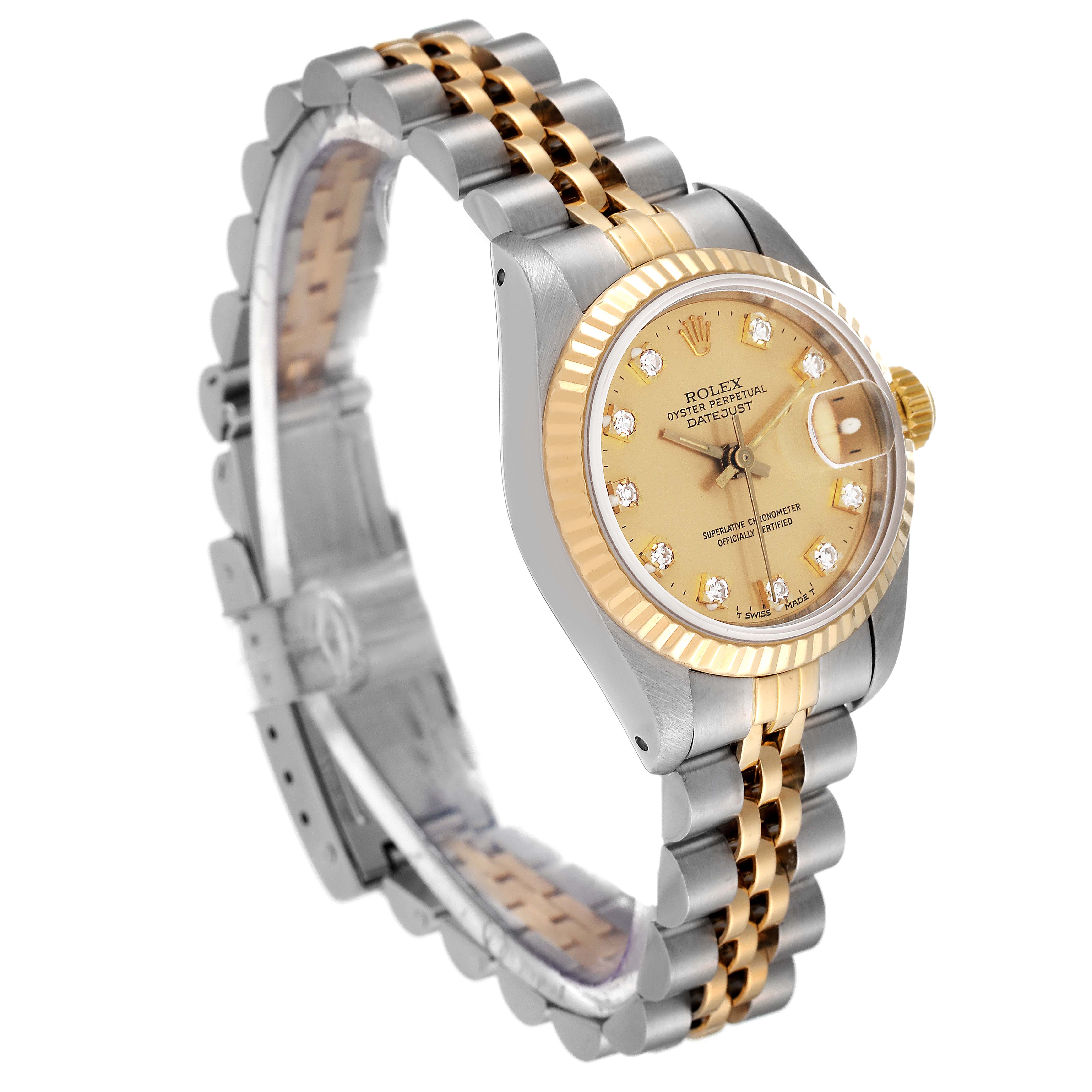 The Rolex Datejust 69173 Women's Steel and Gold (two tone) Champagne Dial 69173 Women's Steel and Gold (two tone) Champagne Dial watch is shown at a three-quarter angle, displaying its gold and silver bracelet, dial, bezel, and clasp.