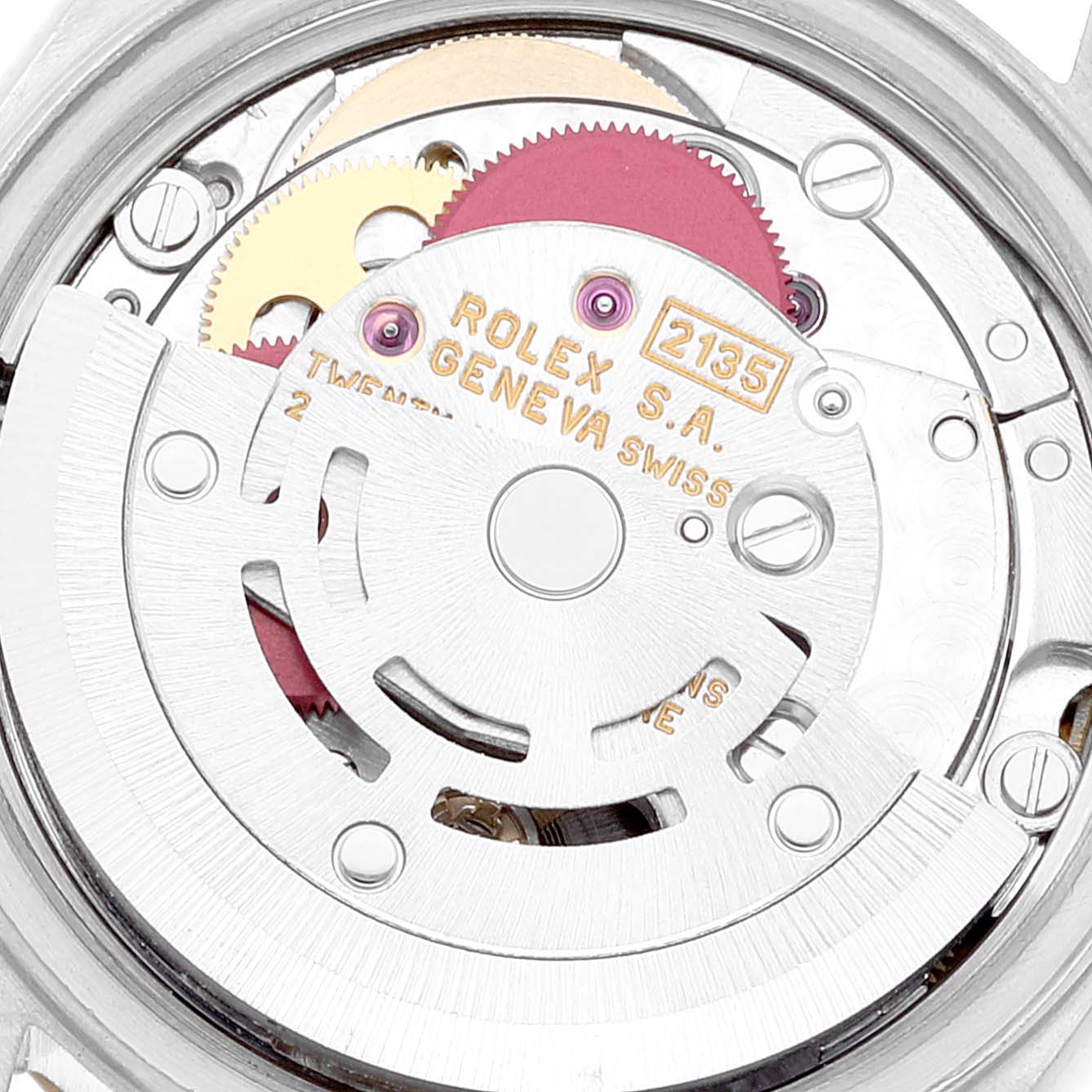 This image shows a close-up of the inner mechanism of a Rolex Datejust 69173 Women's Steel and Gold (two tone) Champagne Dial 69173 Women's Steel and Gold (two tone) Champagne Dial watch, highlighting the movement and gears.