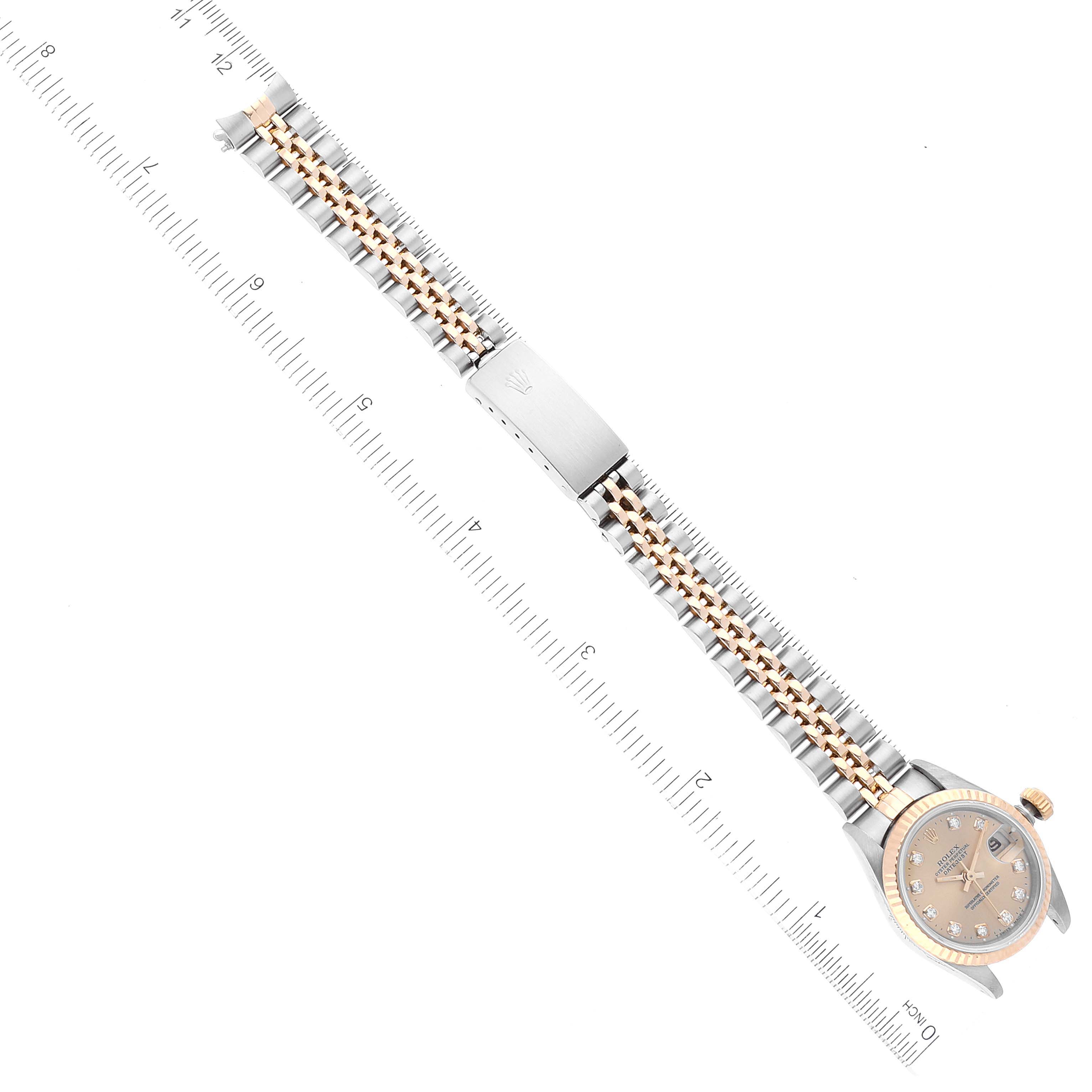 The image shows a Rolex Datejust 69173 Women's Steel and Gold (two tone) Champagne Dial 69173 Women's Steel and Gold (two tone) Champagne Dial watch photographed from above, featuring its full bracelet, clasp, and case.