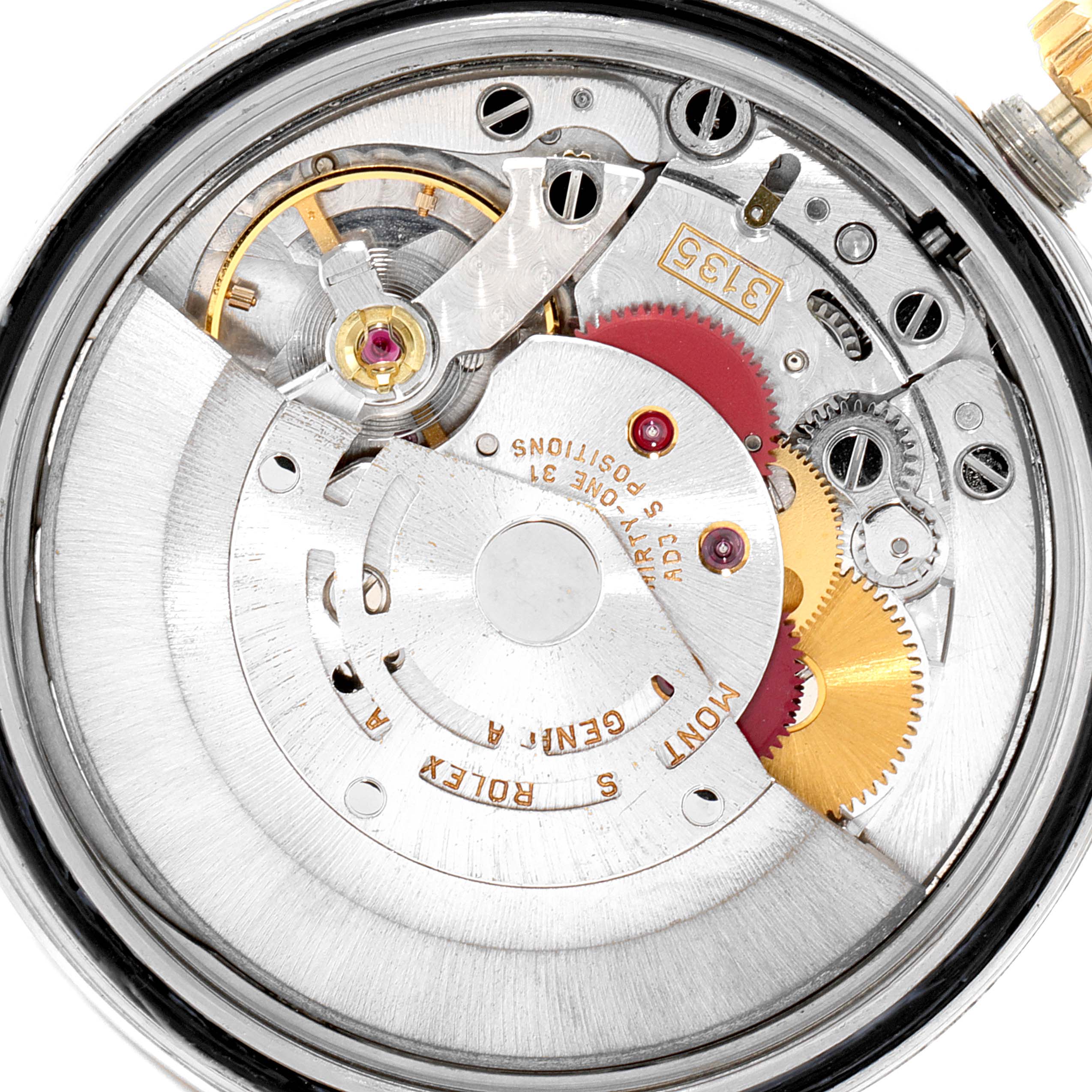 This image shows an internal view of the Rolex Datejust 16233 Men's Steel and Gold (two tone) Champagne Dial 16233 Men's Steel and Gold (two tone) Champagne Dial watch movement, displaying gears, screws, and the rotor.