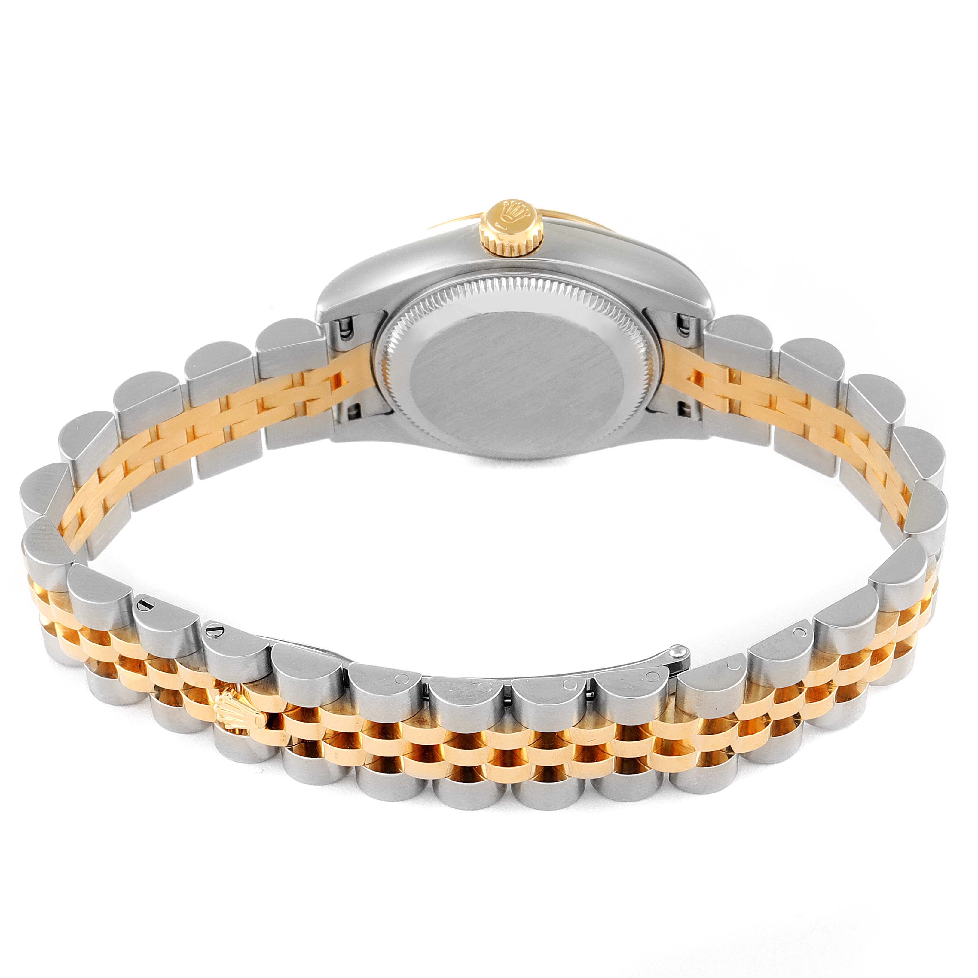This image shows the back of the case and the bracelet of a Rolex Datejust 179173 Women's Steel and Gold (two tone) Pink Dial 179173 Women's Steel and Gold (two tone) Pink Dial watch, highlighting the two-tone design.