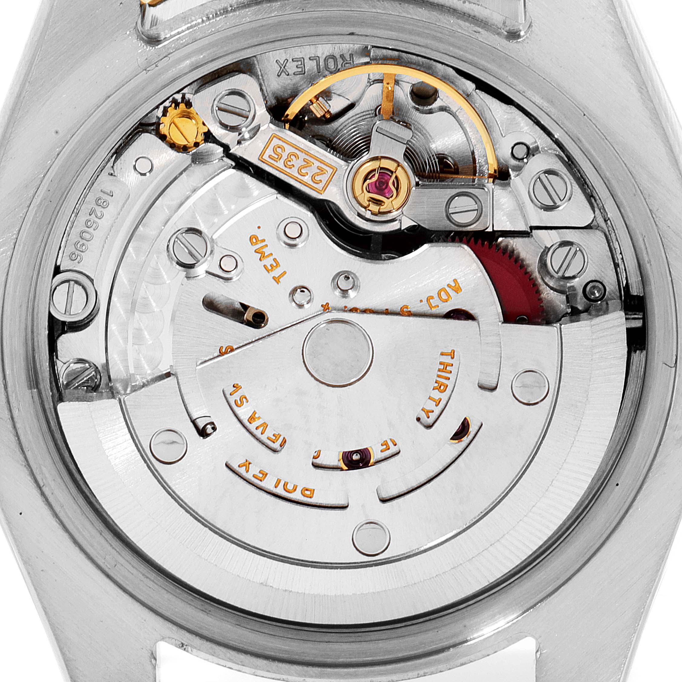 This image shows the intricate internal movement of a Rolex Datejust 179173 Women's Steel and Gold (two tone) Pink Dial 179173 Women's Steel and Gold (two tone) Pink Dial watch from a top-down angle.