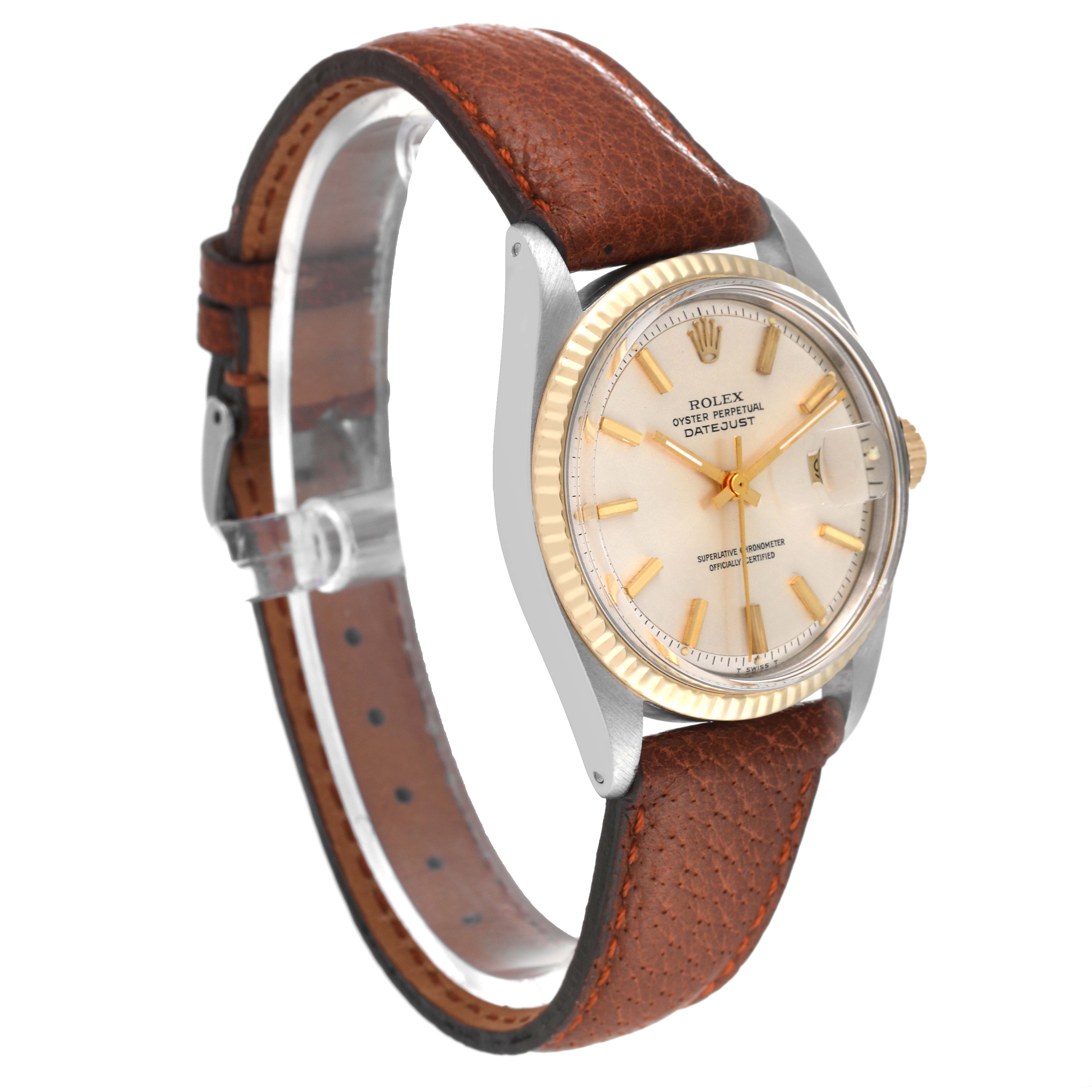 The image shows a side-angle view of the Rolex Vintage Collection 1601 Men's Steel and Gold (two tone) Silver Dial 1601 Men's Steel and Gold (two tone) Silver Dial watch, highlighting its face, case, and brown leather strap.