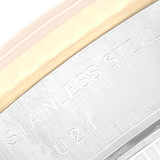 This image shows the stainless steel case back with markings of a Rolex Datejust 69173 Women's Steel and Gold (two tone) White Dial 69173 Women's Steel and Gold (two tone) White Dial watch at a close-up angle.