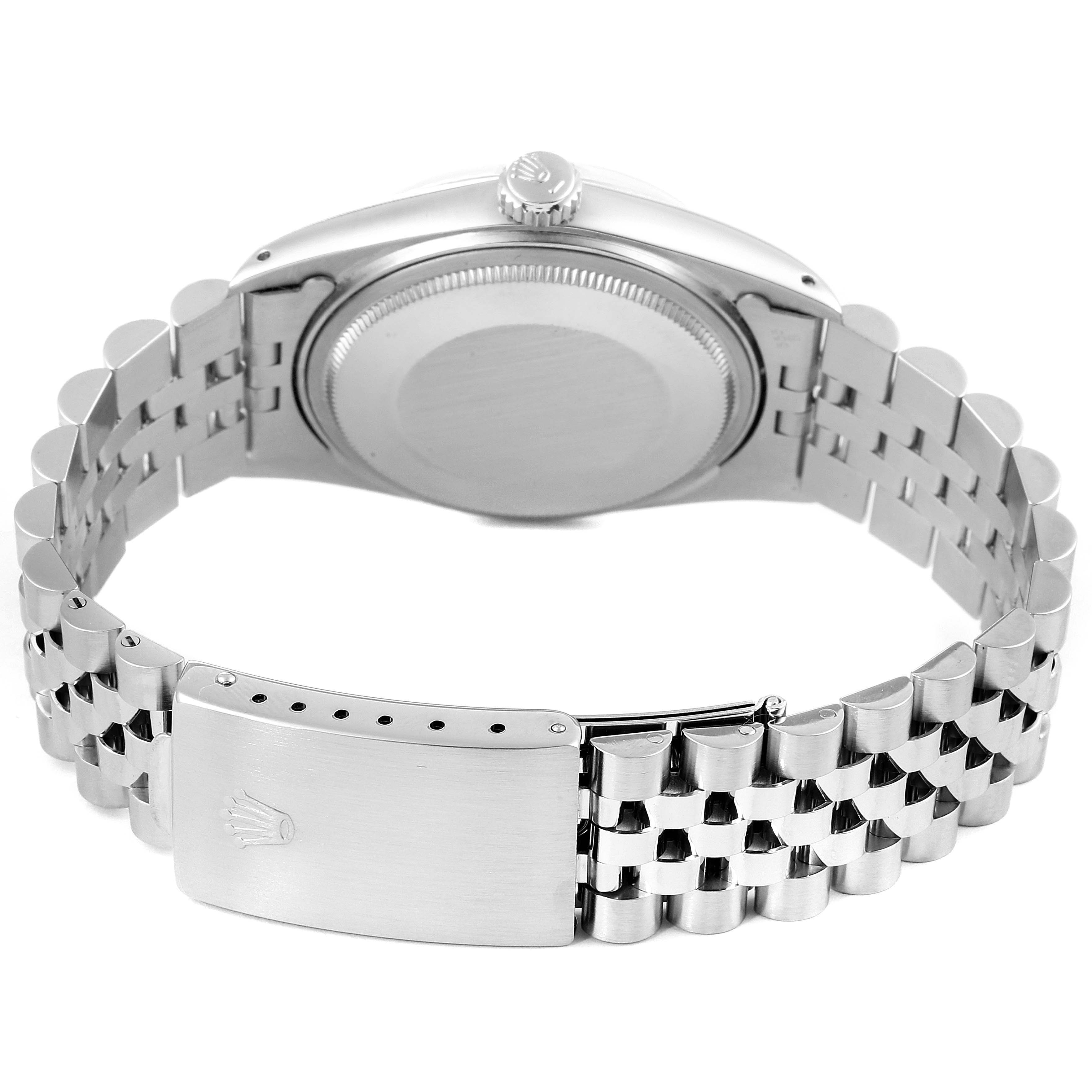 The image shows the back view of a Rolex Vintage Collection 16014 Men's Stainless Steel Blue Dial 16014 Men's Stainless Steel Blue Dial watch with its stainless steel bracelet and clasp.