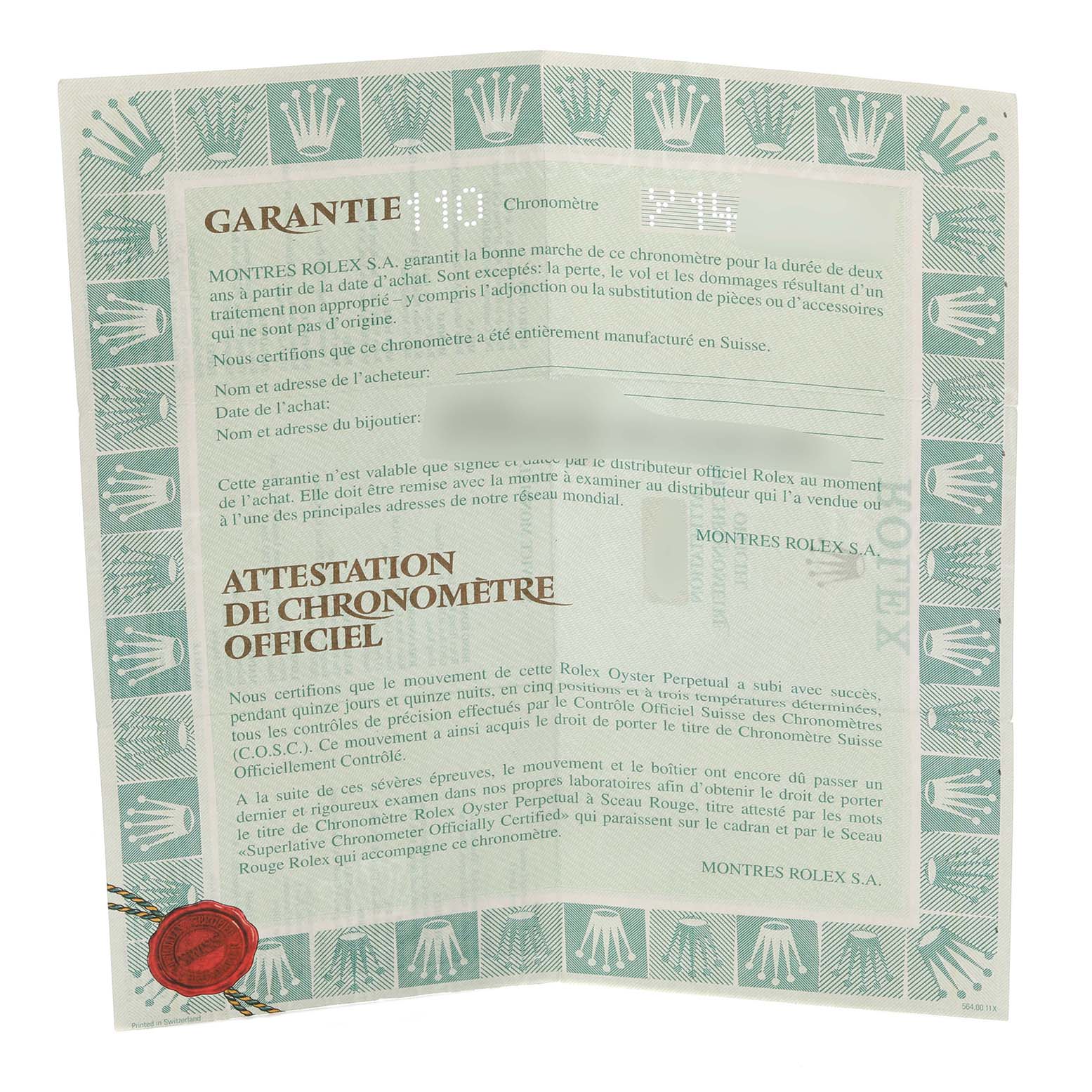 The image shows a folded warranty certificate for the Rolex Daytona 116523NR Men's Steel and Gold (two tone) Mother of Pearl Dial 116523NR Men's Steel and Gold (two tone) Mother of Pearl Dial, displaying the brand's logo and text.