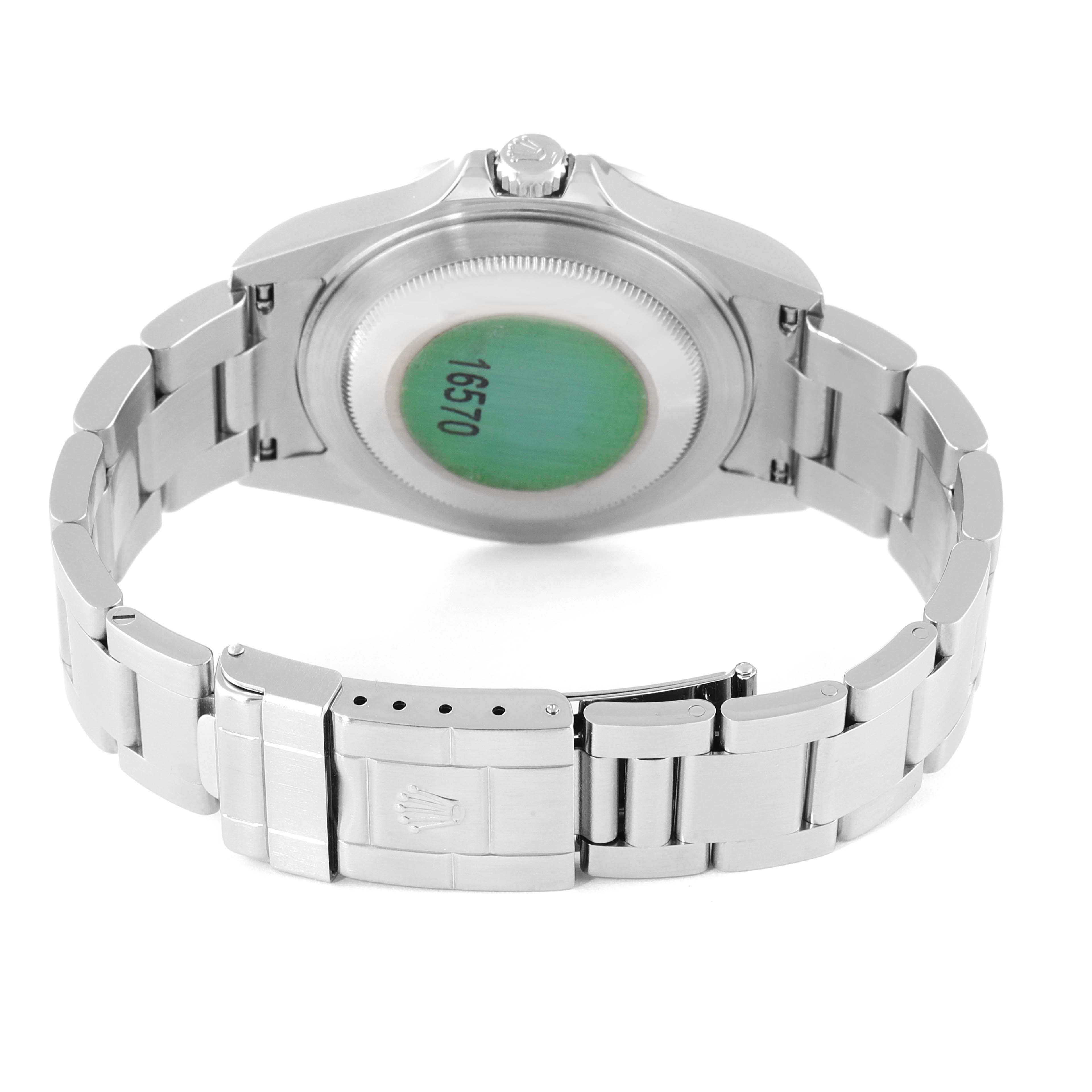 This image shows the back view of a Rolex Explorer 16570 Men's Stainless Steel White Dial 16570 Men's Stainless Steel White Dial watch, highlighting its clasp, bracelet, and caseback.