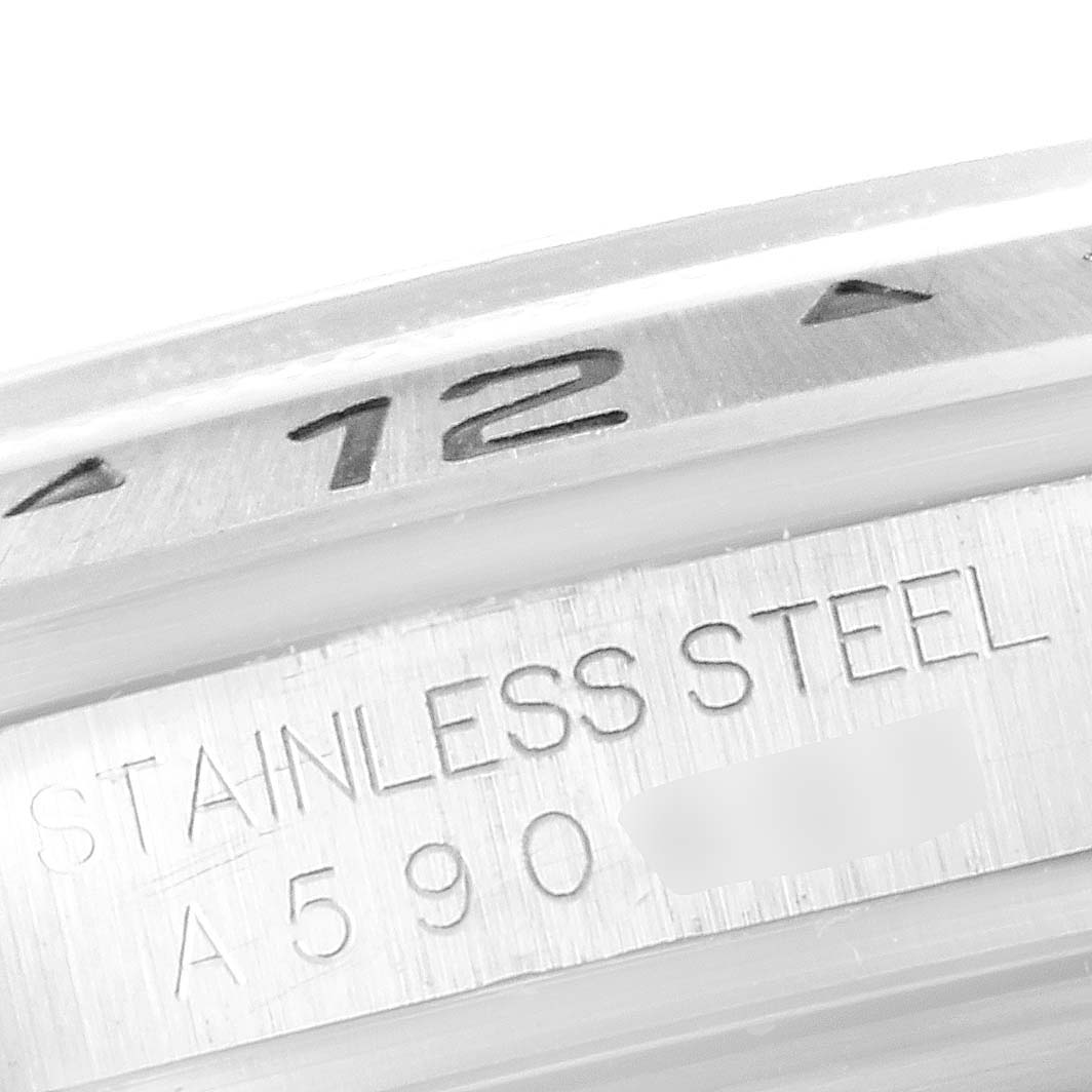 The image shows a close-up of the stainless steel case side and part of the bezel with numerals of a Rolex Explorer 16570 Men
s Stainless Steel Black Dial 16570 Men
s Stainless Steel Black Dial watch.