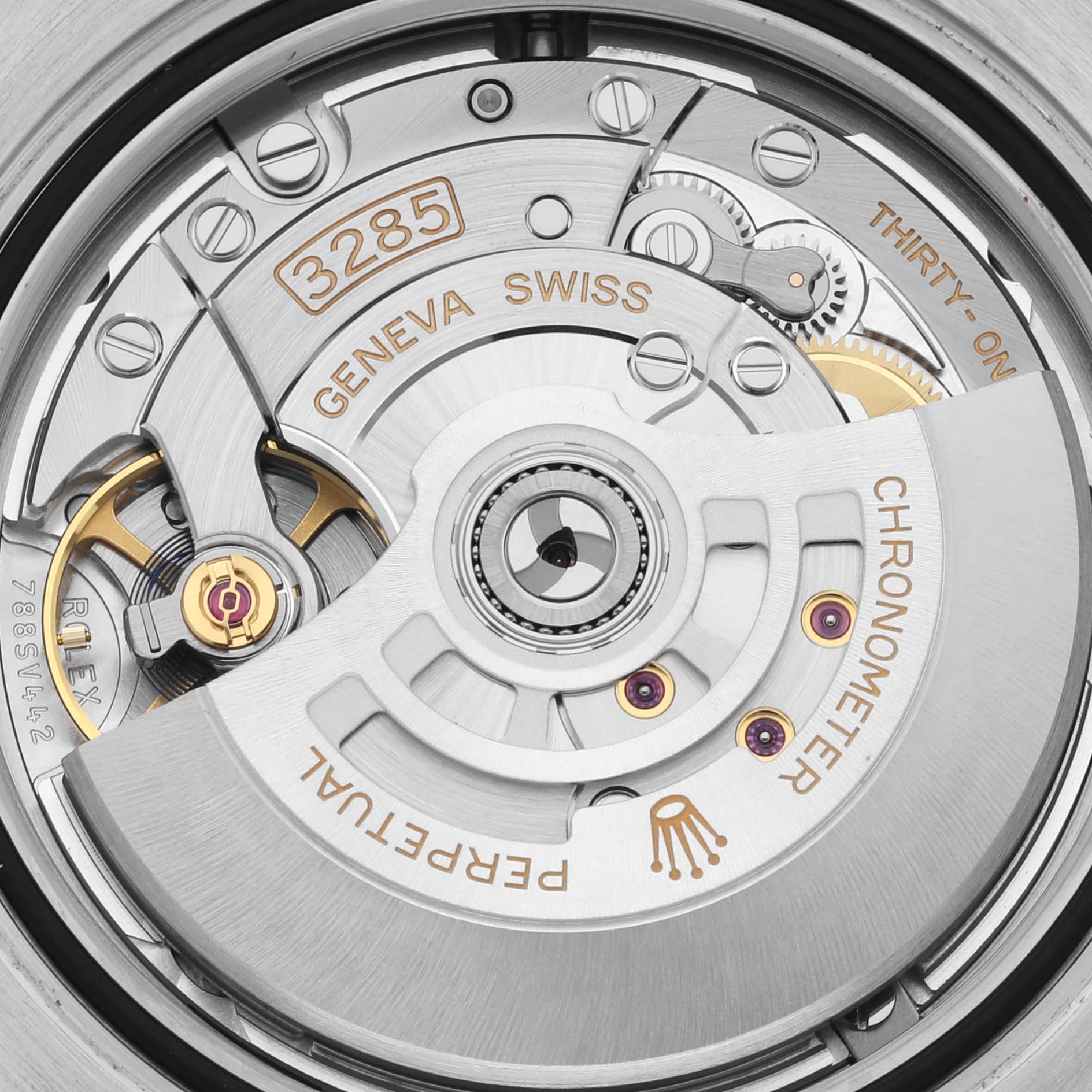 The image shows a close-up of the movement of a Rolex GMT-Master 68251 Men
s Stainless Steel Black Dial 68251 Men
s Stainless Steel Black Dial watch, highlighting the rotor and gears.