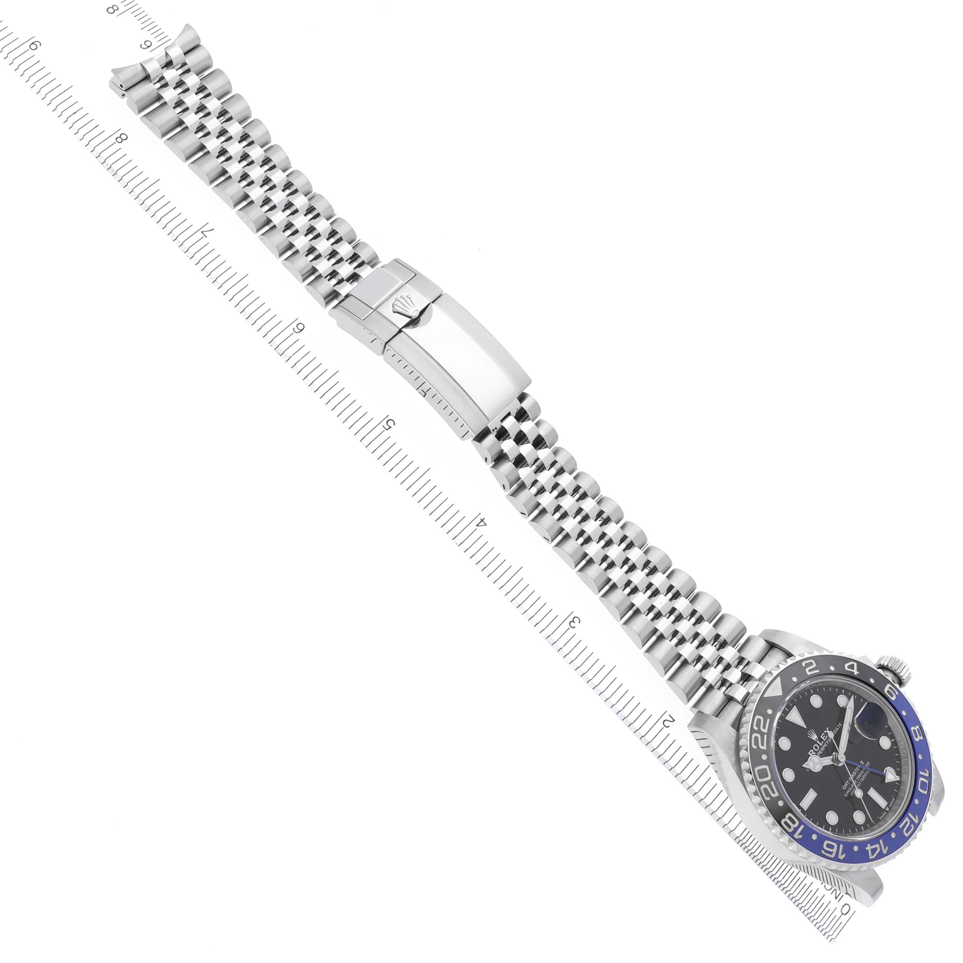 The image shows a Rolex GMT-Master 68251 Men
s Stainless Steel Black Dial 68251 Men
s Stainless Steel Black Dial watch from an overhead angle, featuring the bracelet, clasp, and bezel.