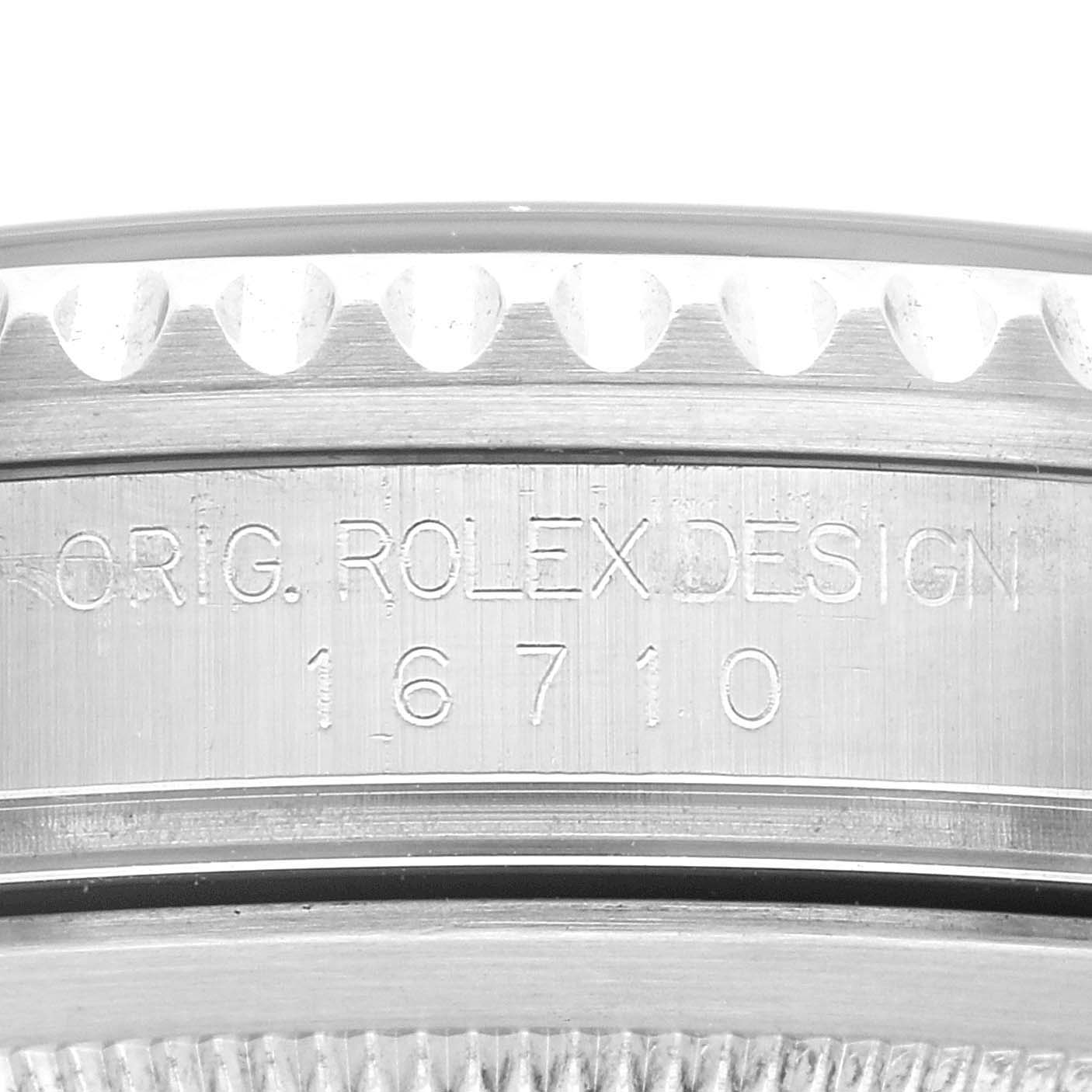 The image shows the side view of the bezel and case with the model number "16710" engraved on a Rolex GMT-Master 16710 Men
s Stainless Steel Black Dial 16710 Men
s Stainless Steel Black Dial watch.