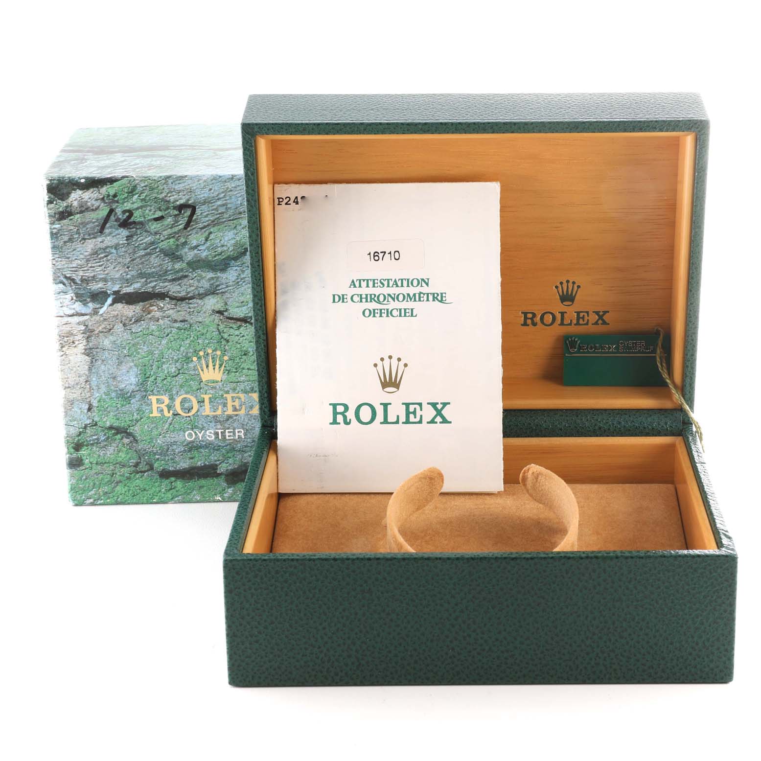 The image shows an open box for a Rolex GMT-Master 16710 Men
s Stainless Steel Black Dial 16710 Men
s Stainless Steel Black Dial watch, its outer packaging, and certification papers.