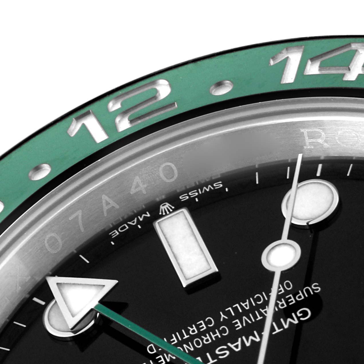 The image shows a close-up of the bezel, part of the dial, and hands of the Rolex GMT-Master 126720VTNR Men's Stainless Steel Black Dial 126720VTNR Men's Stainless Steel Black Dial watch, highlighting the 12 and 14 numerals.